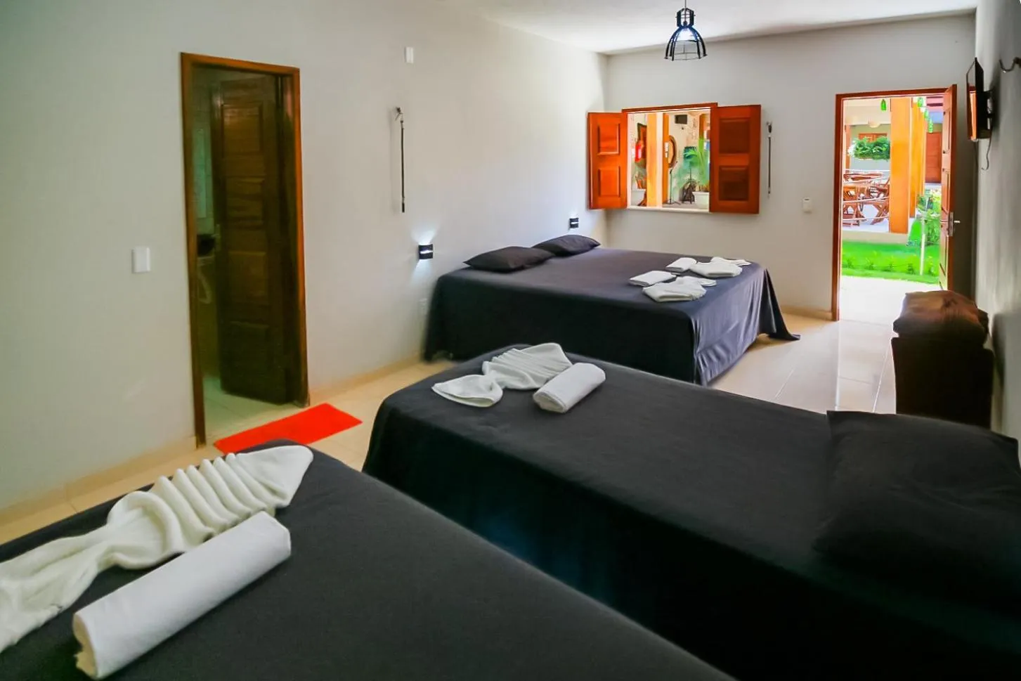 Bed in Pousada Recanto Beach