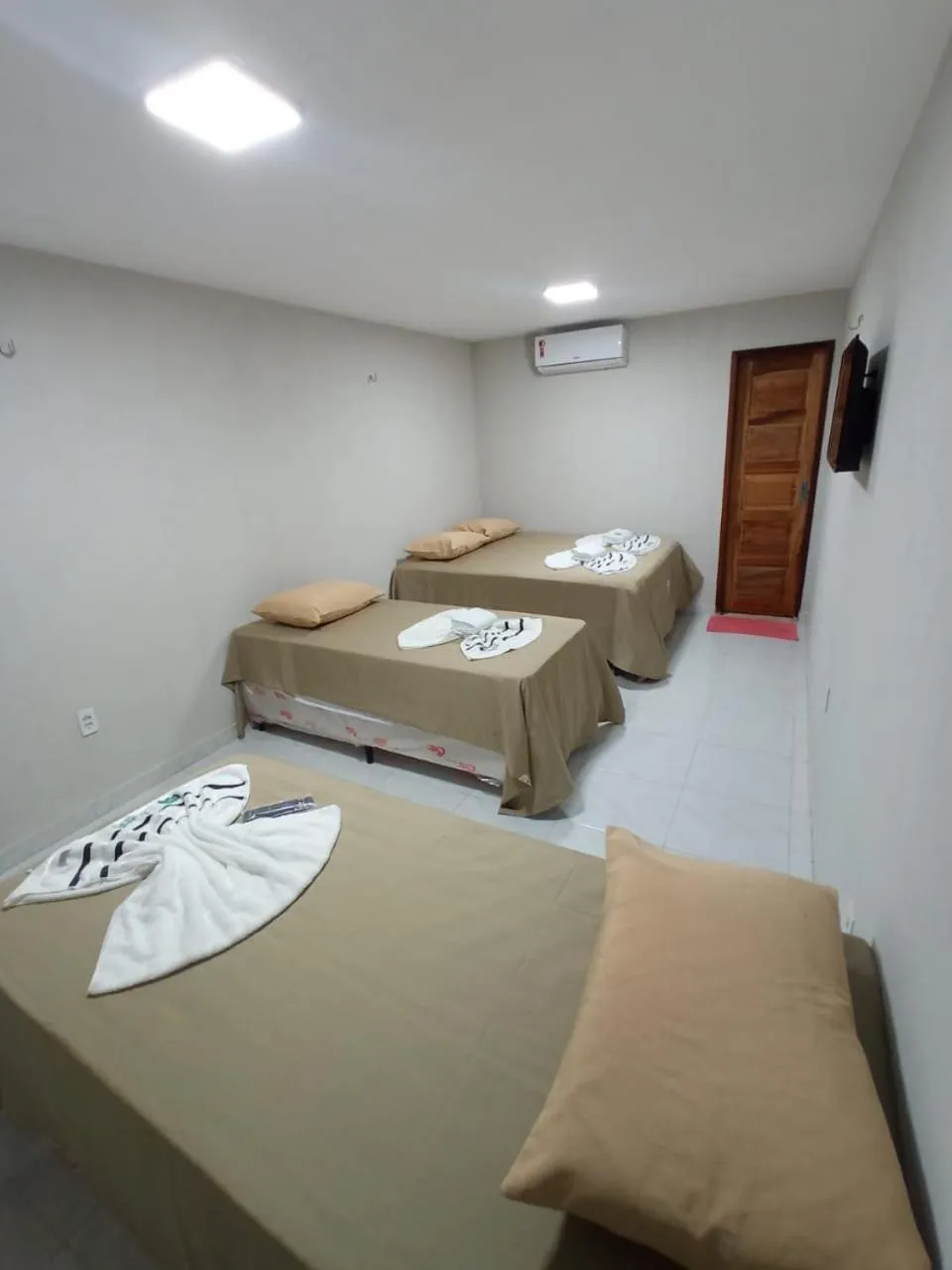 Bed in Pousada Recanto Beach