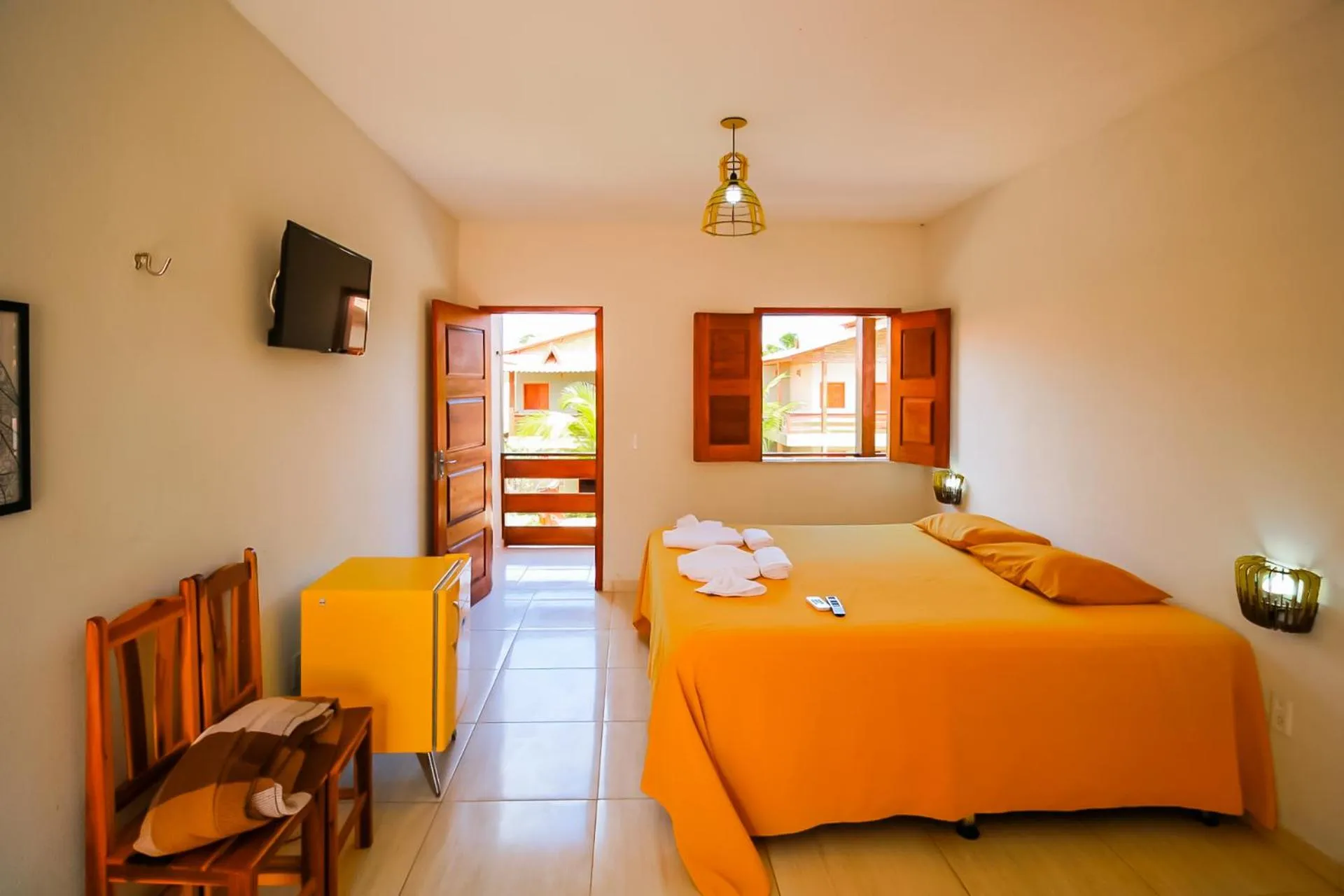 Bed in Pousada Recanto Beach