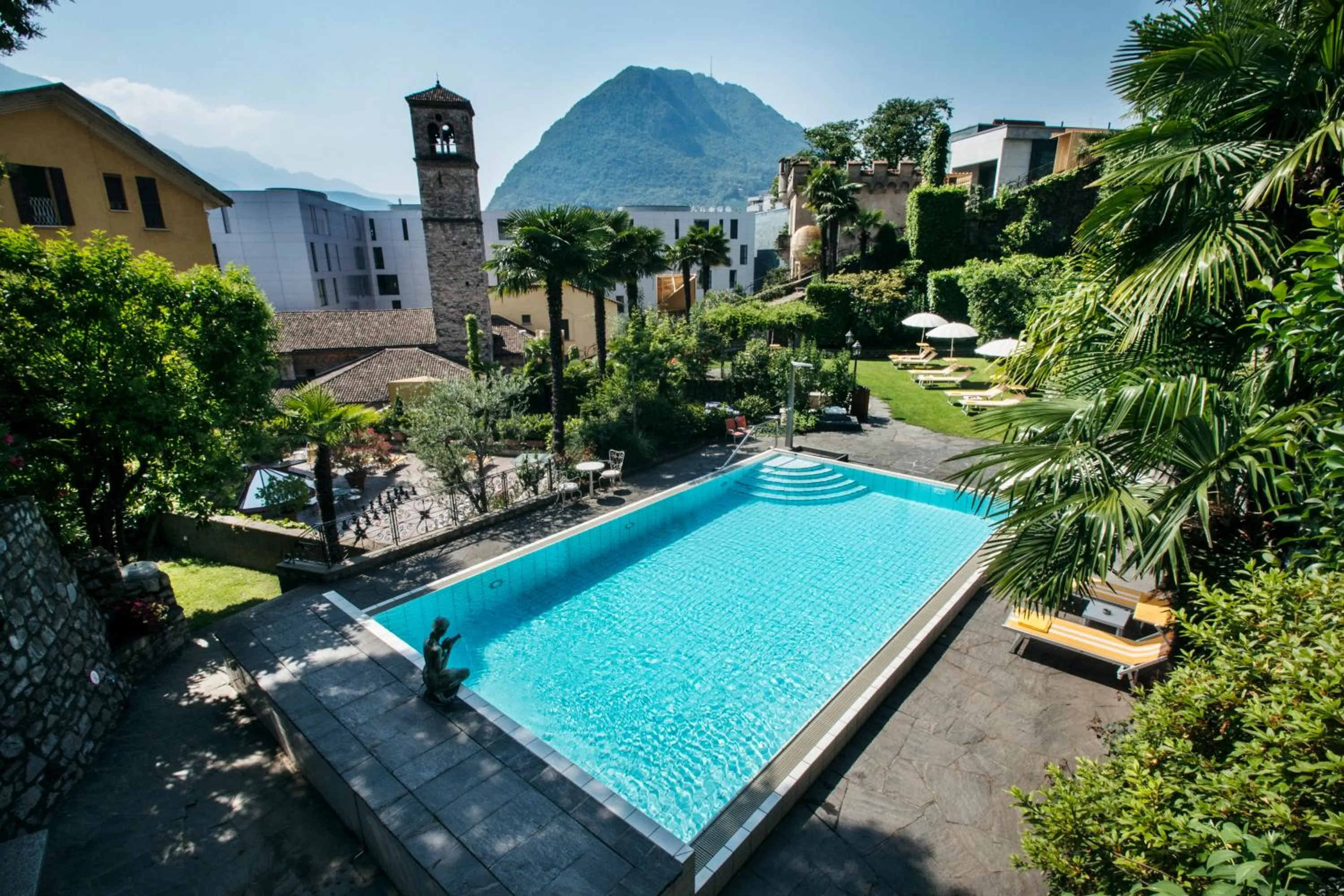 Garden in International au Lac Historic Lakeside Hotel