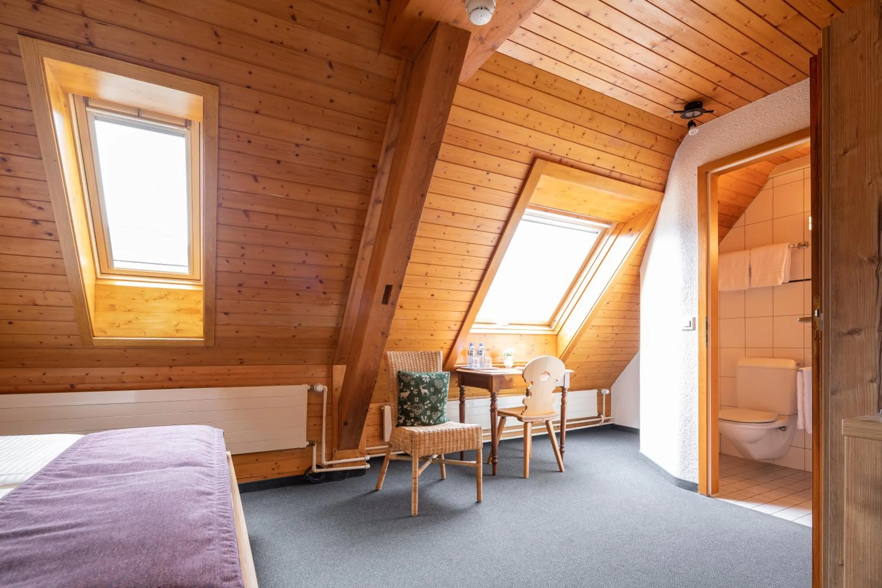 Photo of the whole room, Bed in Hotel Lötschberg