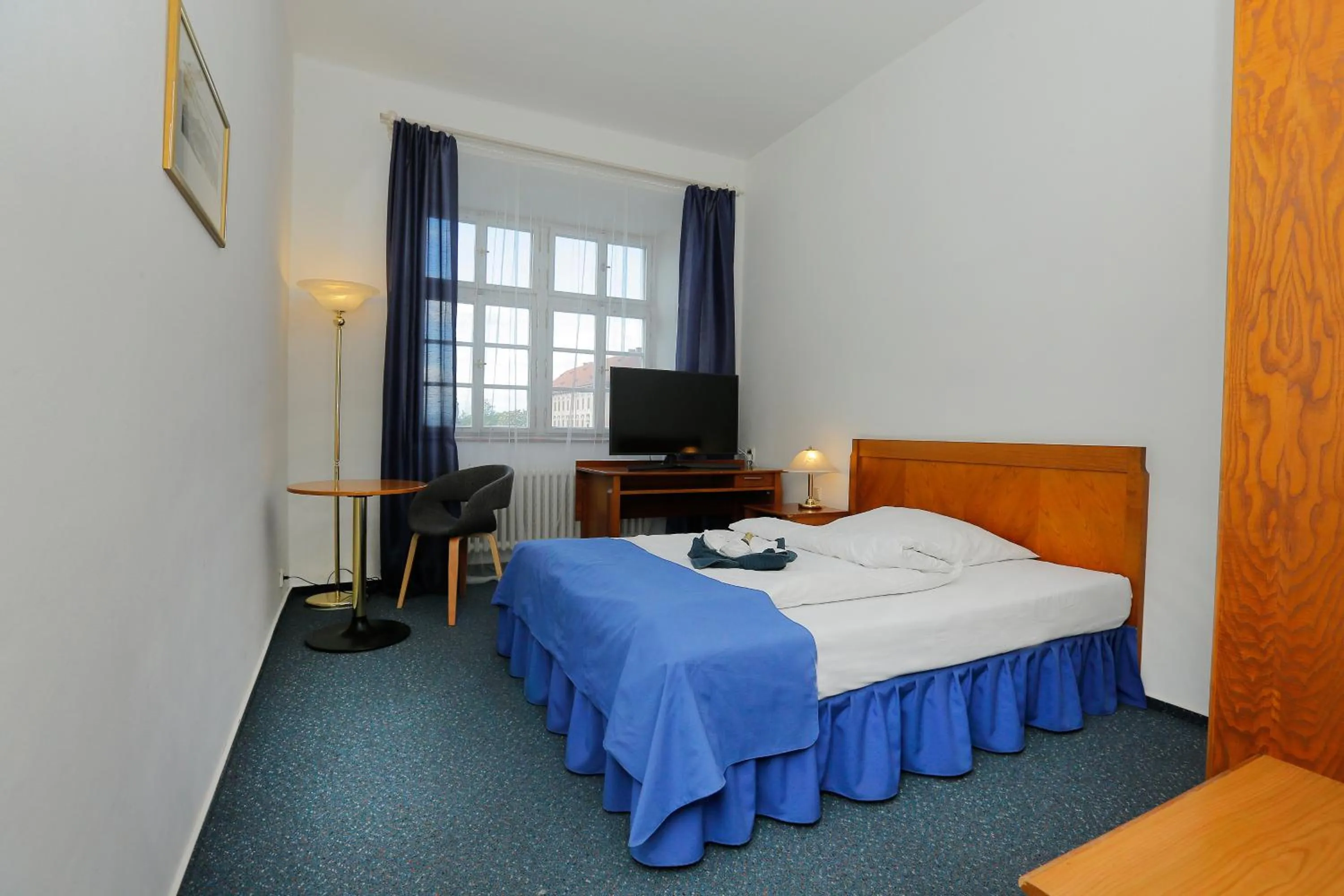 Communal lounge/ TV room in Hotel Magnolia