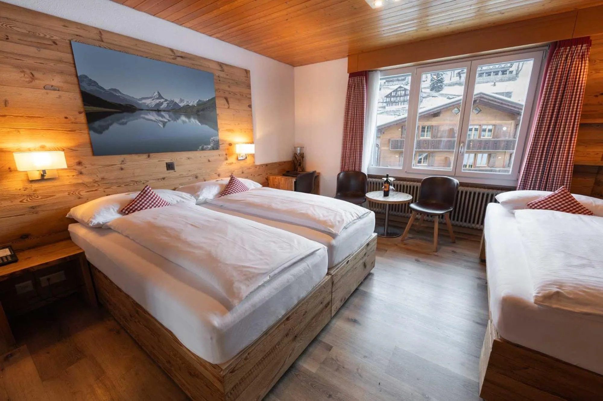 Photo of the whole room, Bed in Hotel Bernerhof Grindelwald
