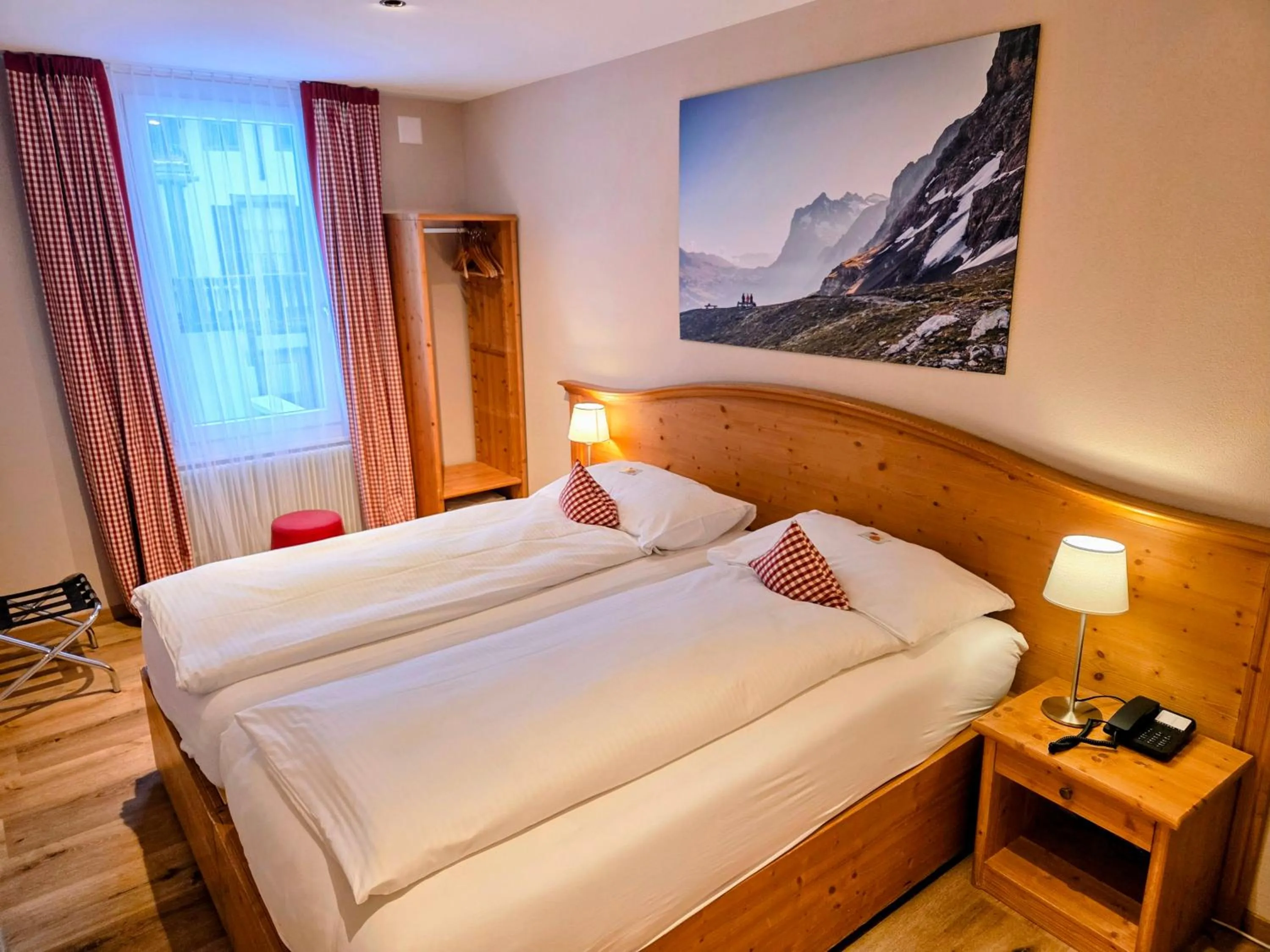 Photo of the whole room, Bed in Hotel Bernerhof Grindelwald