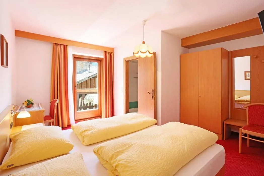 Bed in Gasthof Albergo Neuwirt