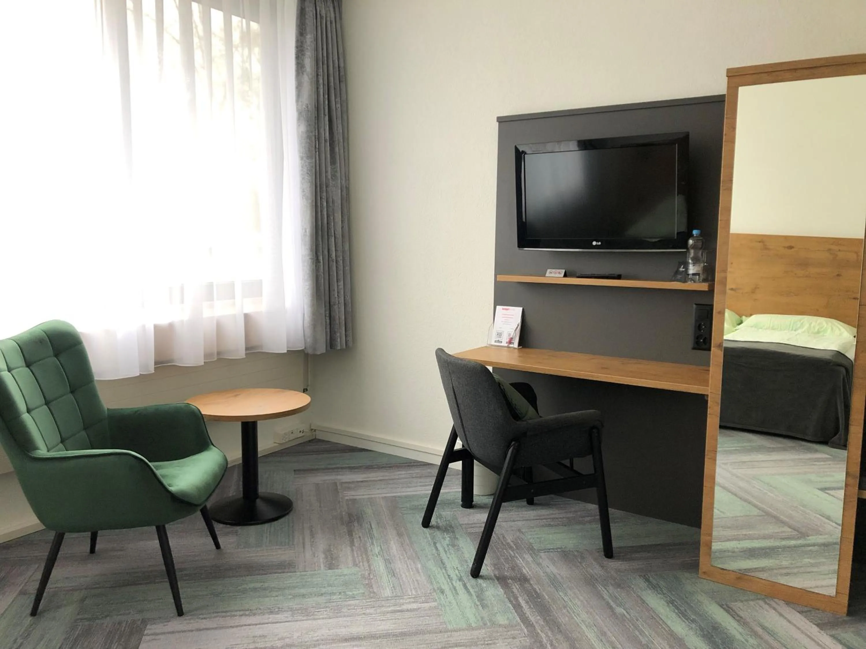 TV and multimedia in Budget Motel Self Check-In