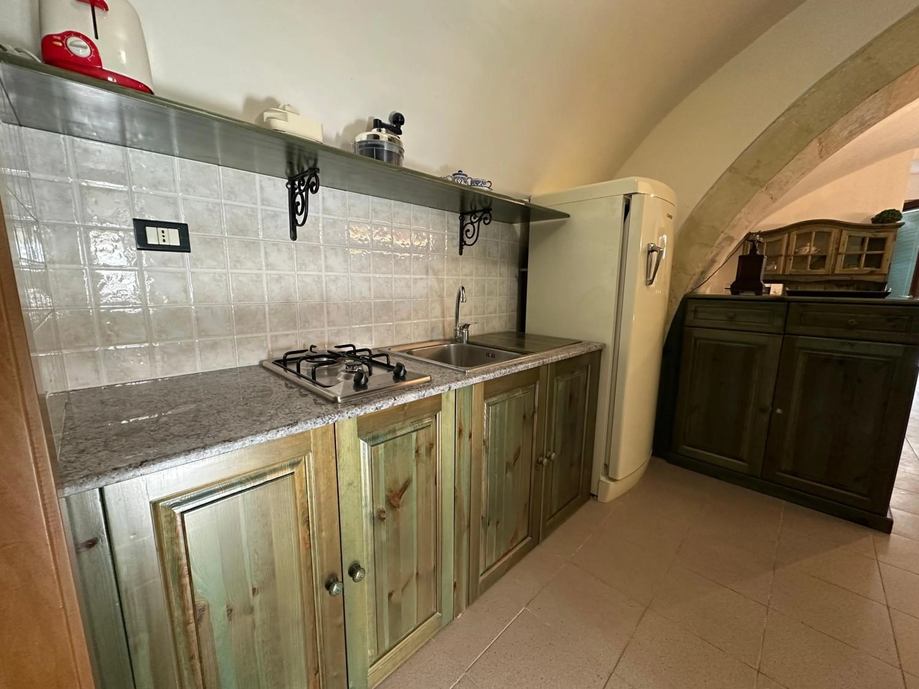 Communal kitchen in Historic B&B Apartments Home