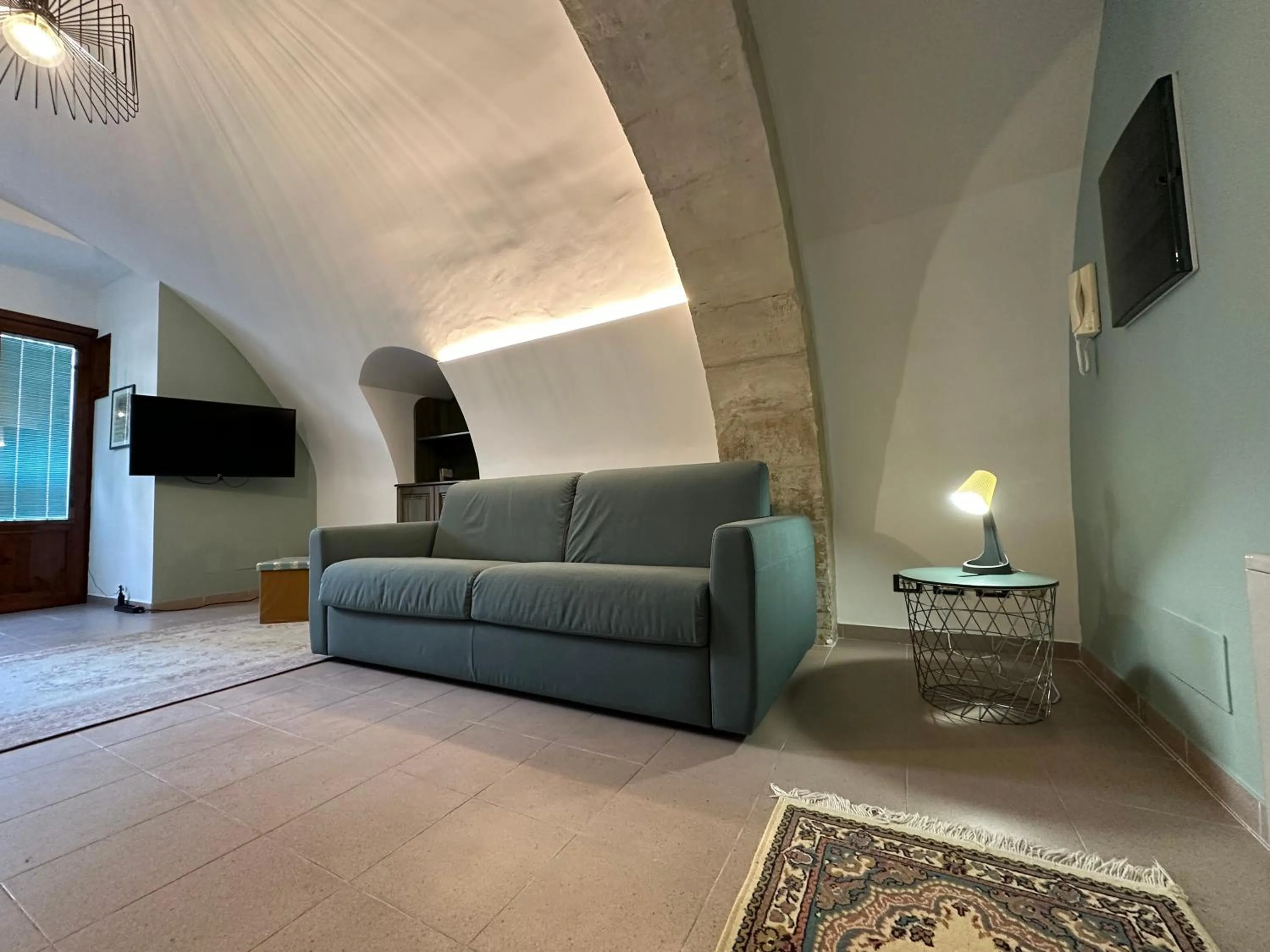 Communal lounge/ TV room in Historic B&B Apartments Home