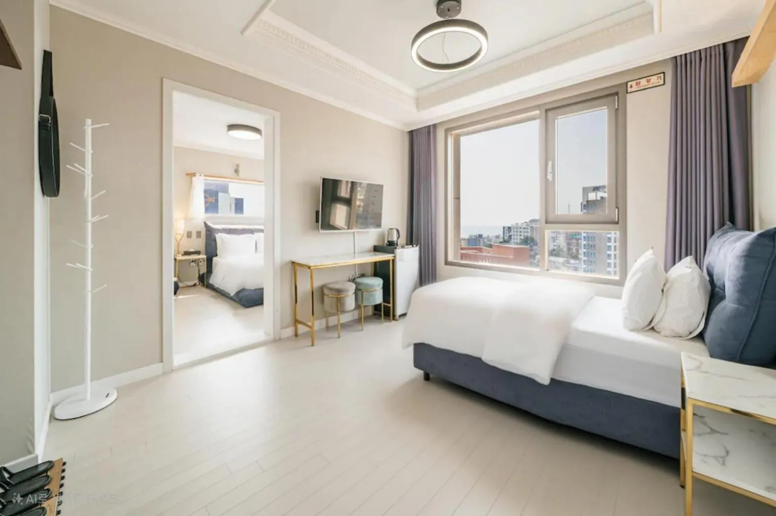 Bed in Cornerstone Hotel