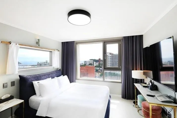 Bed in Cornerstone Hotel