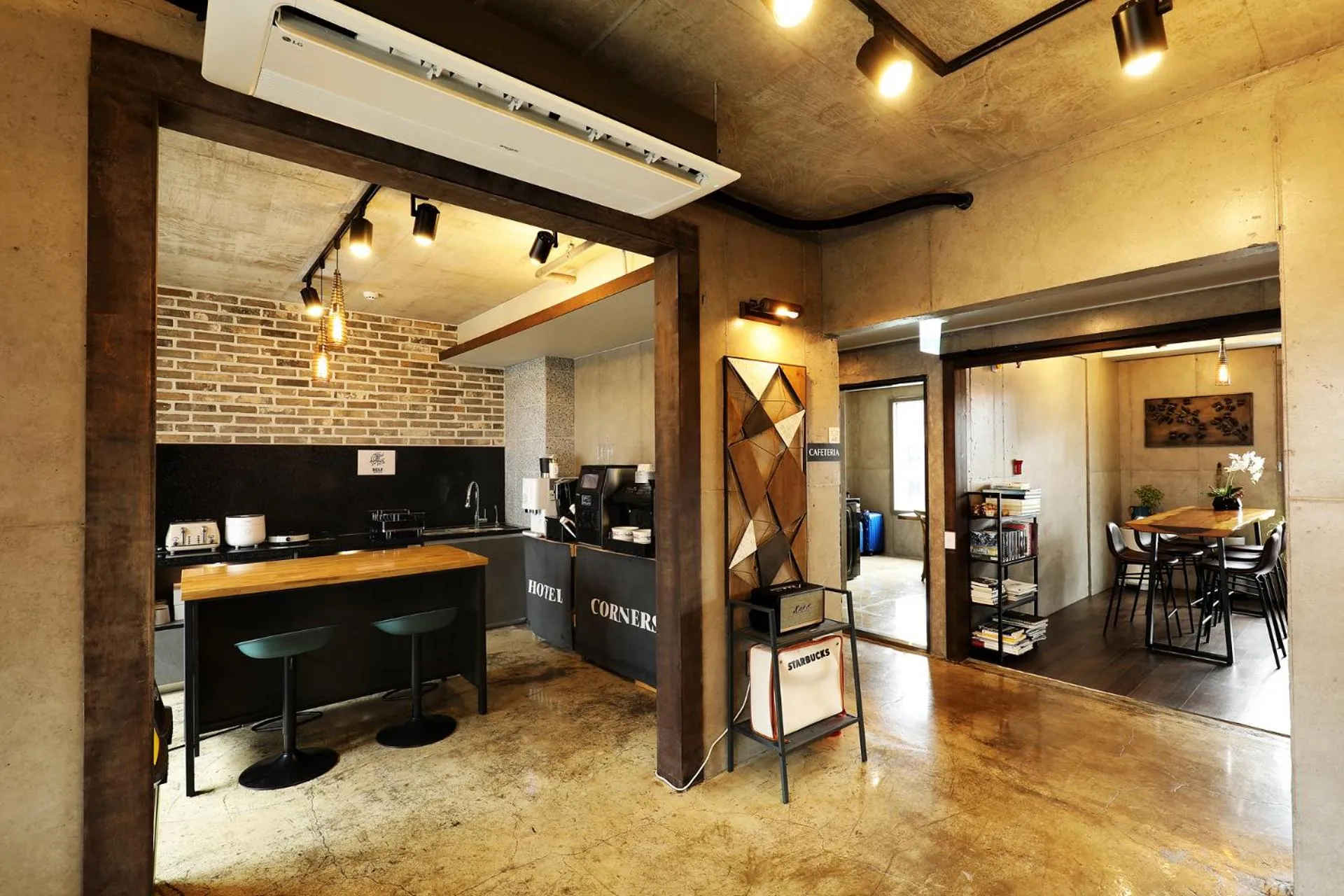 Communal lounge/ TV room in Cornerstone Hotel