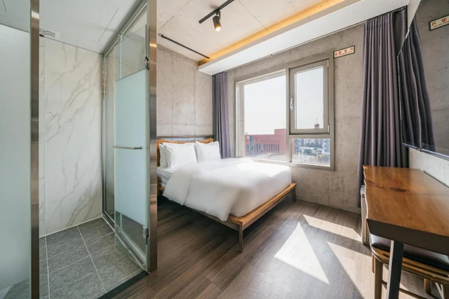 Bed in Cornerstone Hotel