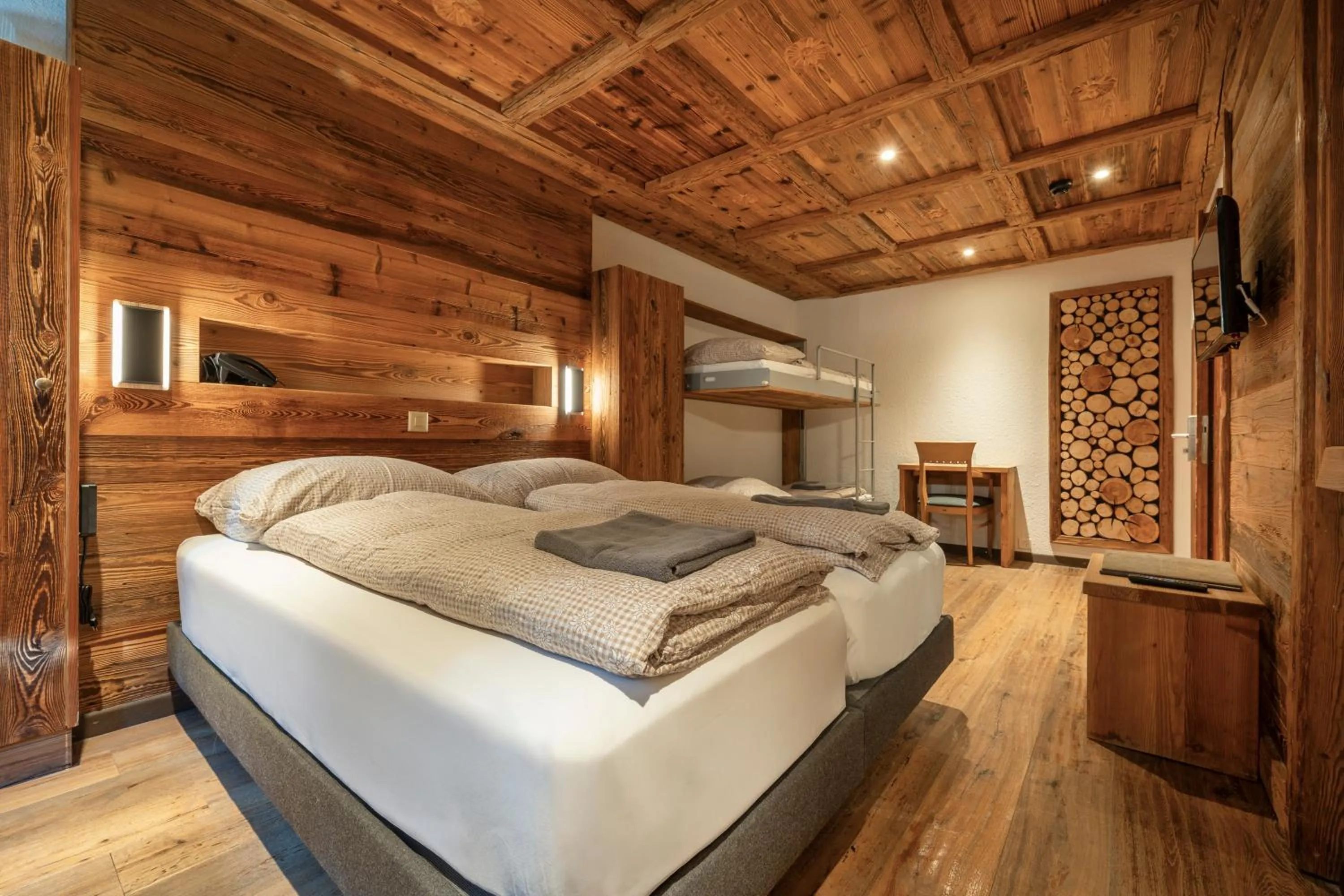 Bed in Hôtel Le Grand Chalet