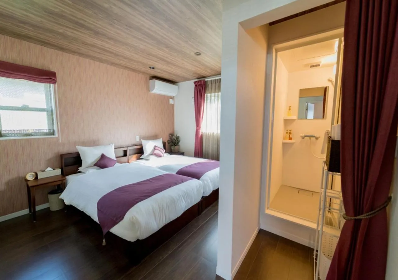 Bed in BEVERLY HILLS VILLA Miyakojima Resort