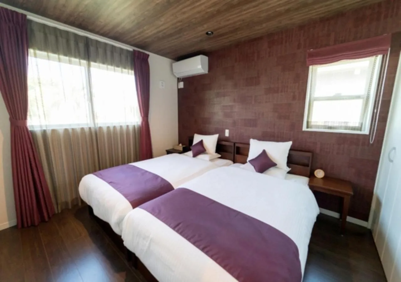 Bed in BEVERLY HILLS VILLA Miyakojima Resort