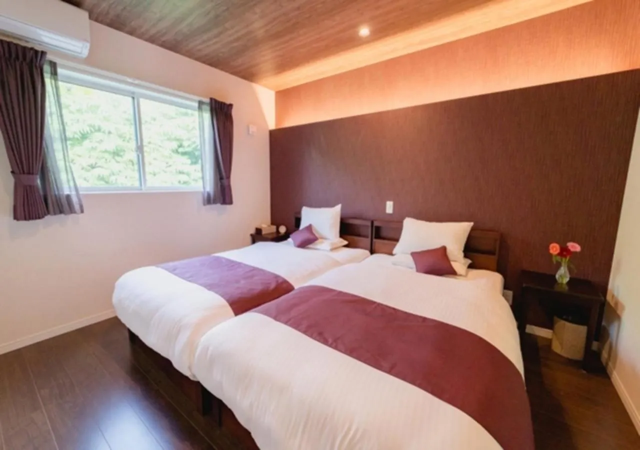 Bed in BEVERLY HILLS VILLA Miyakojima Resort