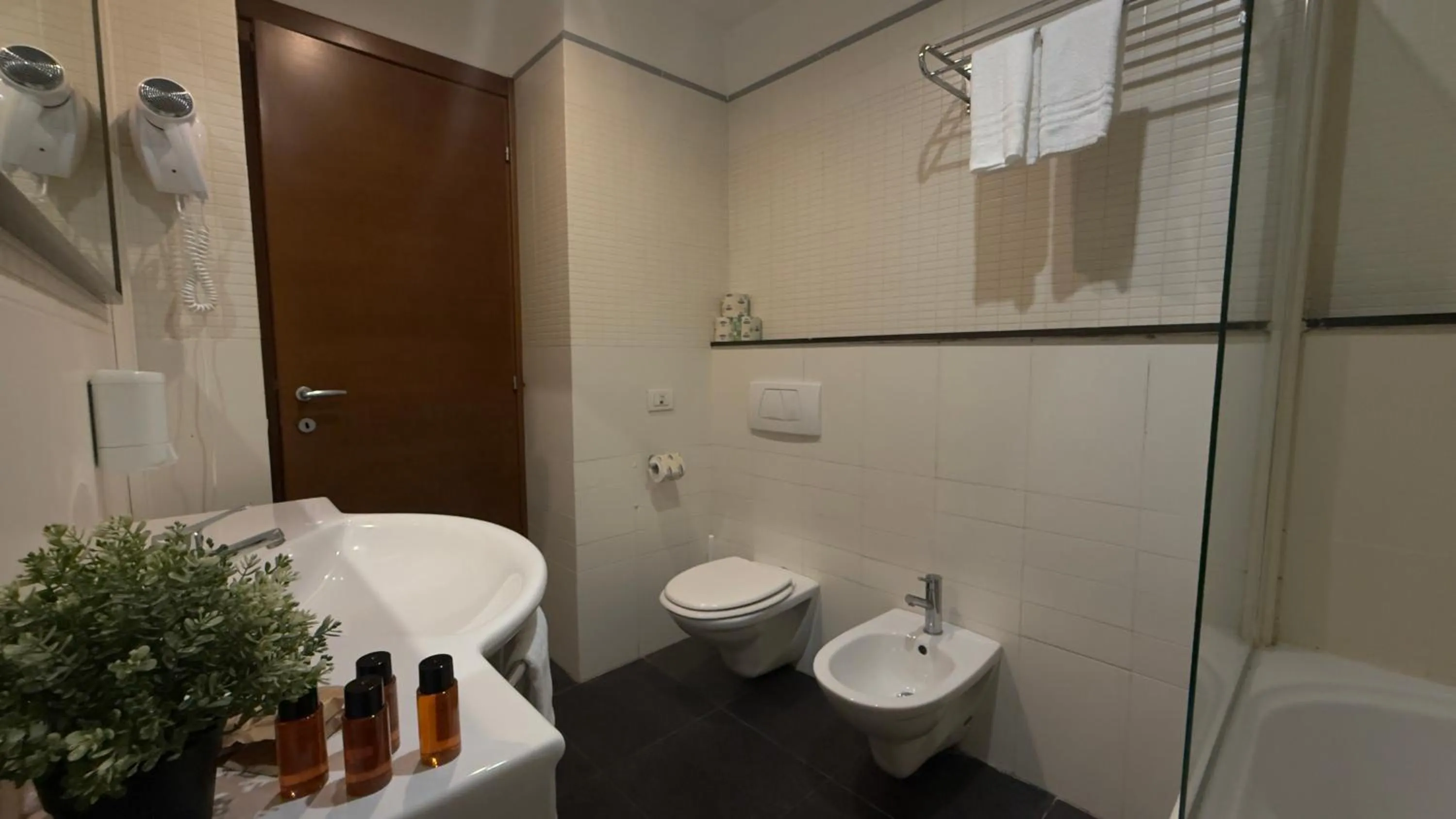 Bathroom in Romalive Hotel