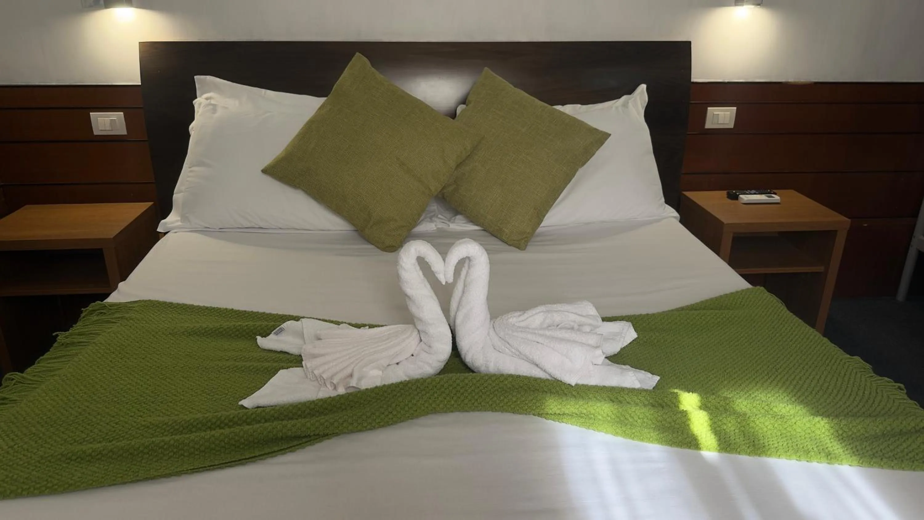 Bed in Romalive Hotel