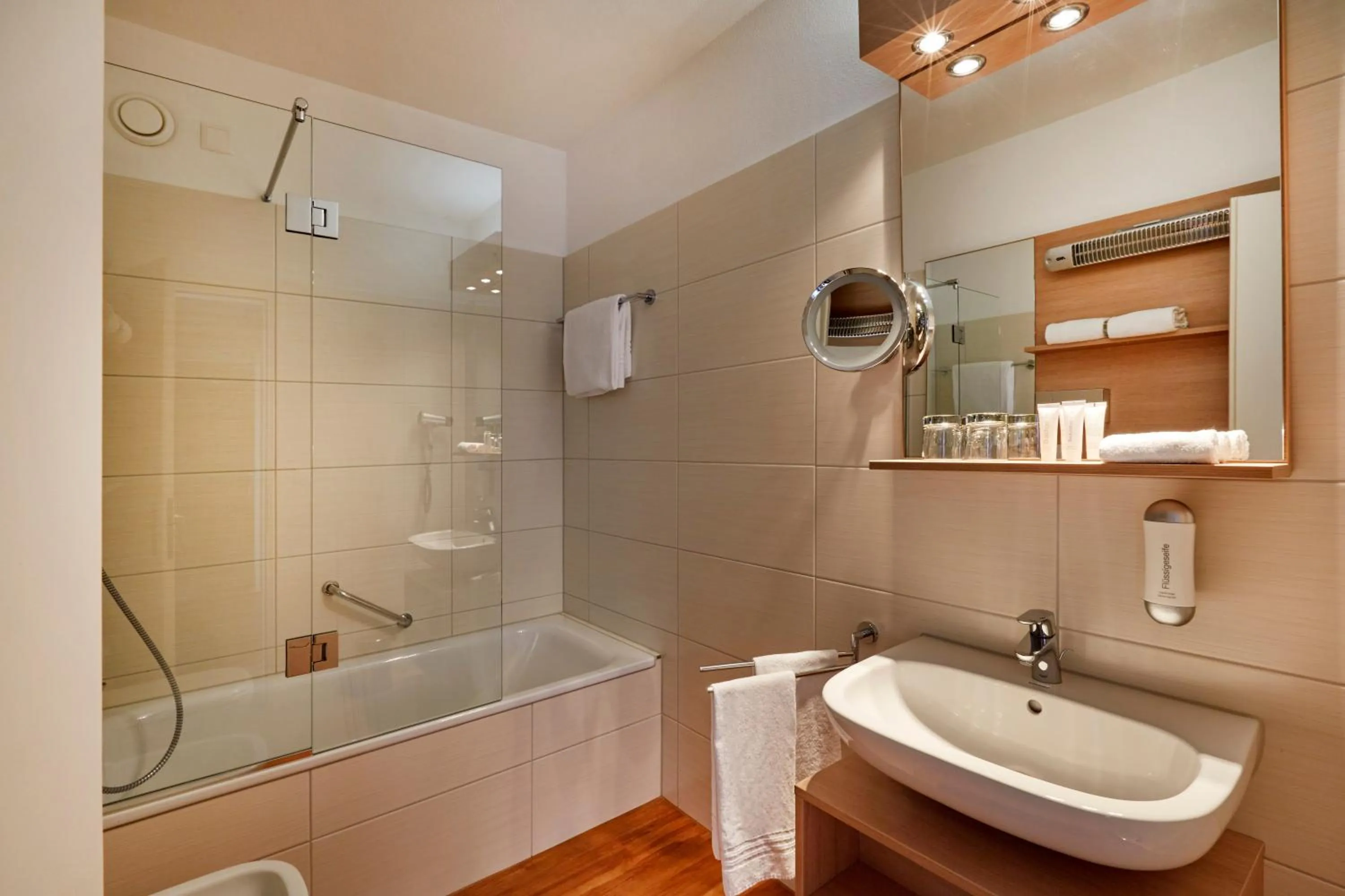 Bathroom in H4 Hotel Arcadia Locarno