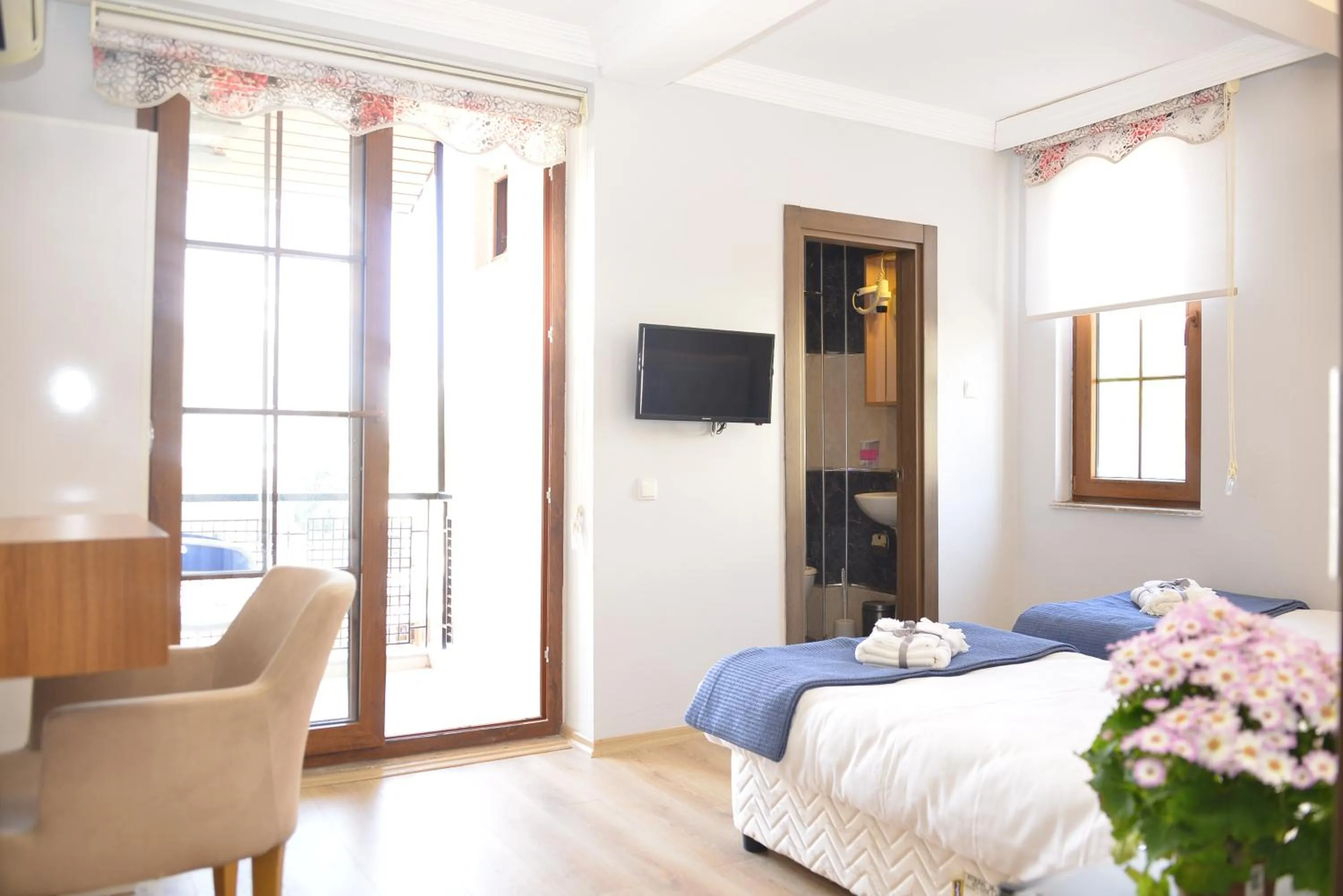 Bed in Pure Diamond Hotel