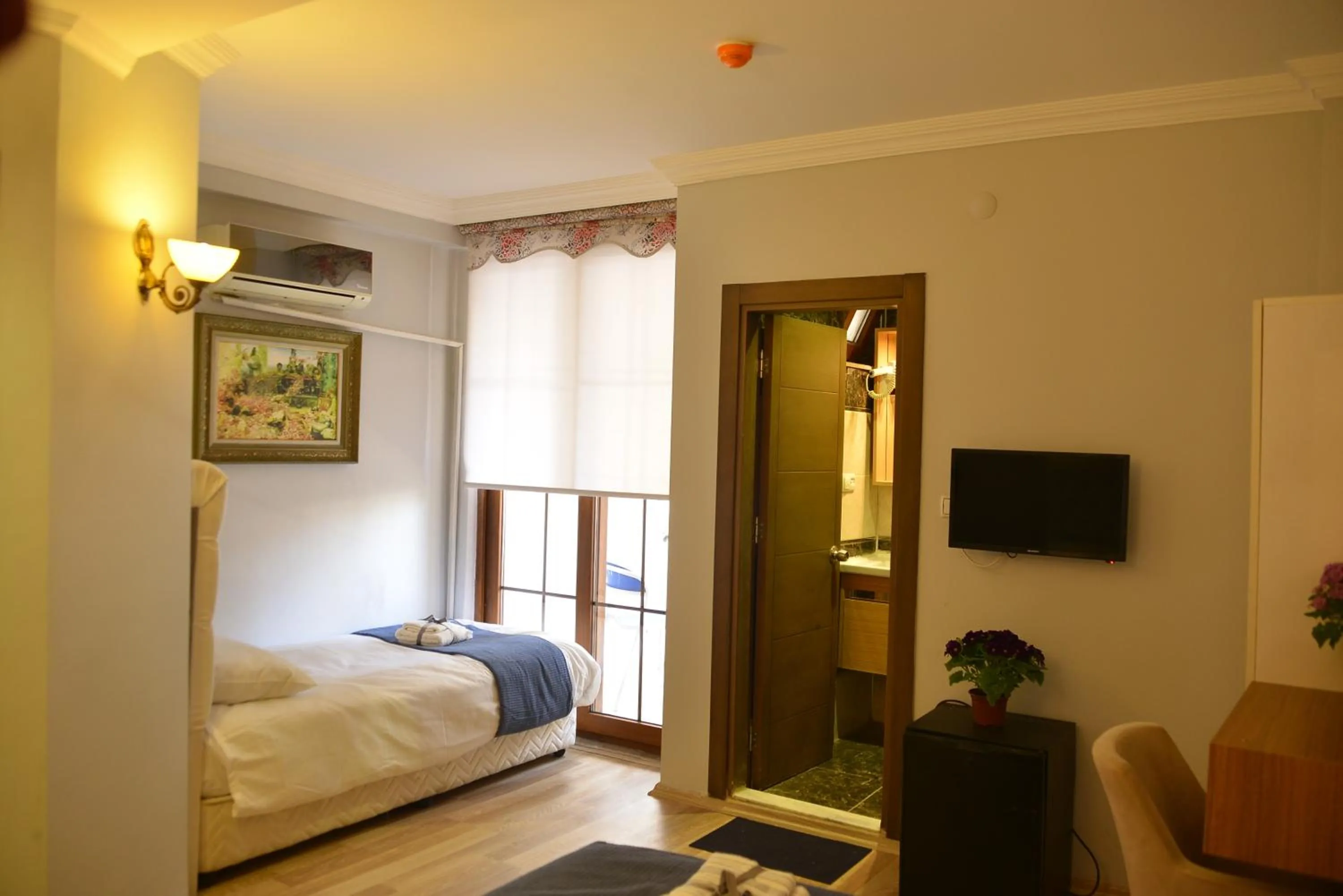 Bed in Pure Diamond Hotel