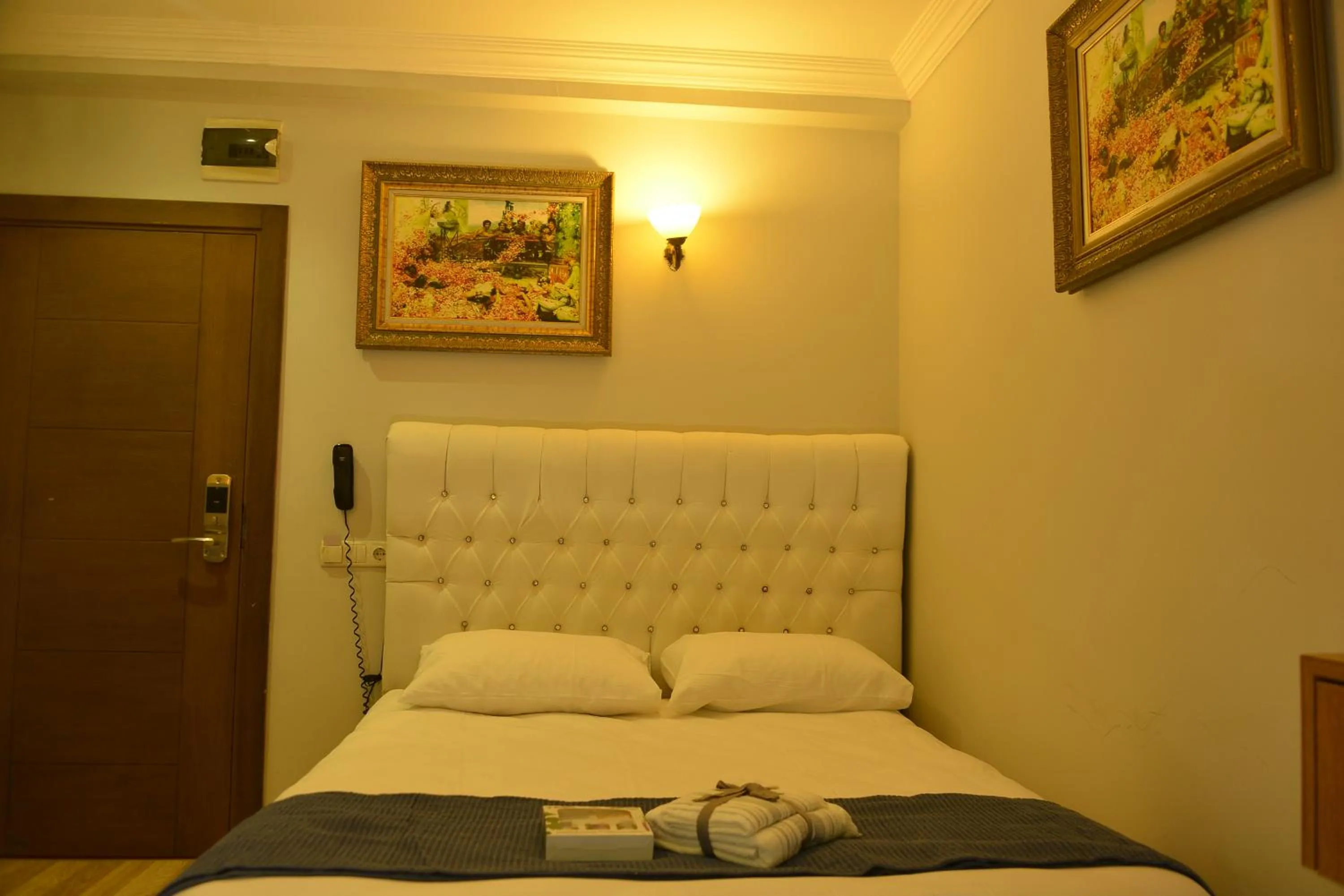 Bed in Pure Diamond Hotel