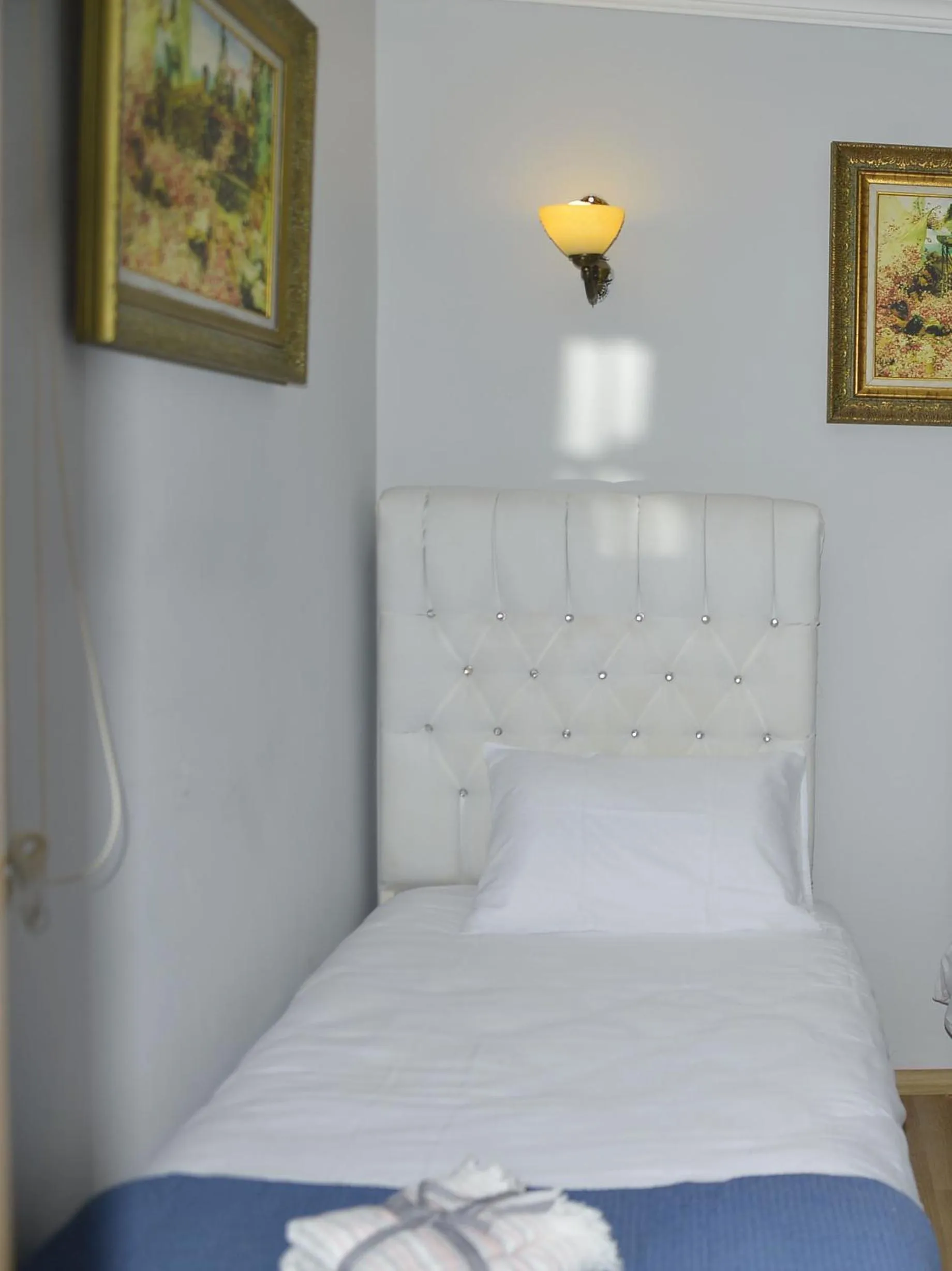 Bed in Pure Diamond Hotel