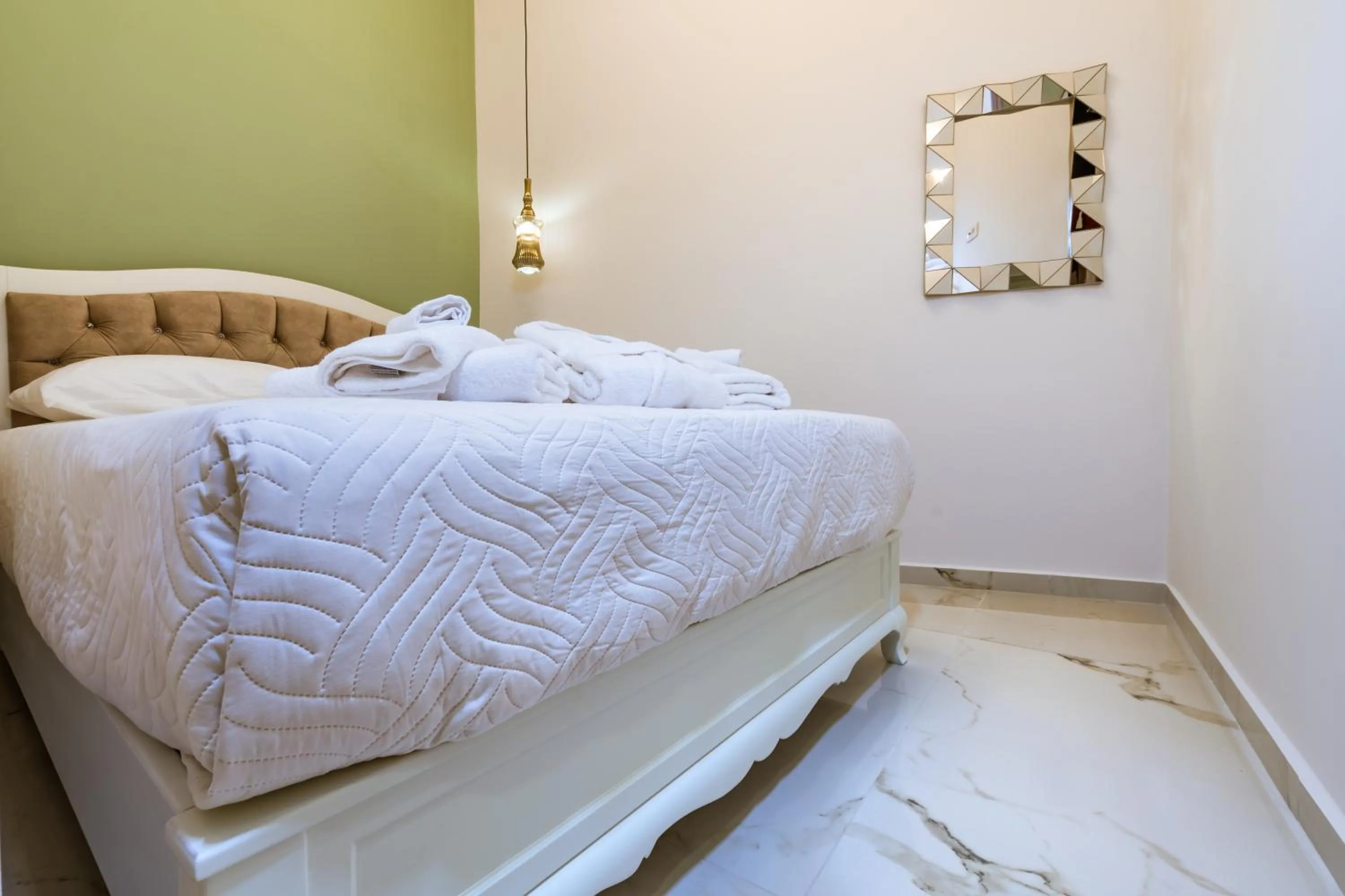 Bed in Konmari Boutique Suites