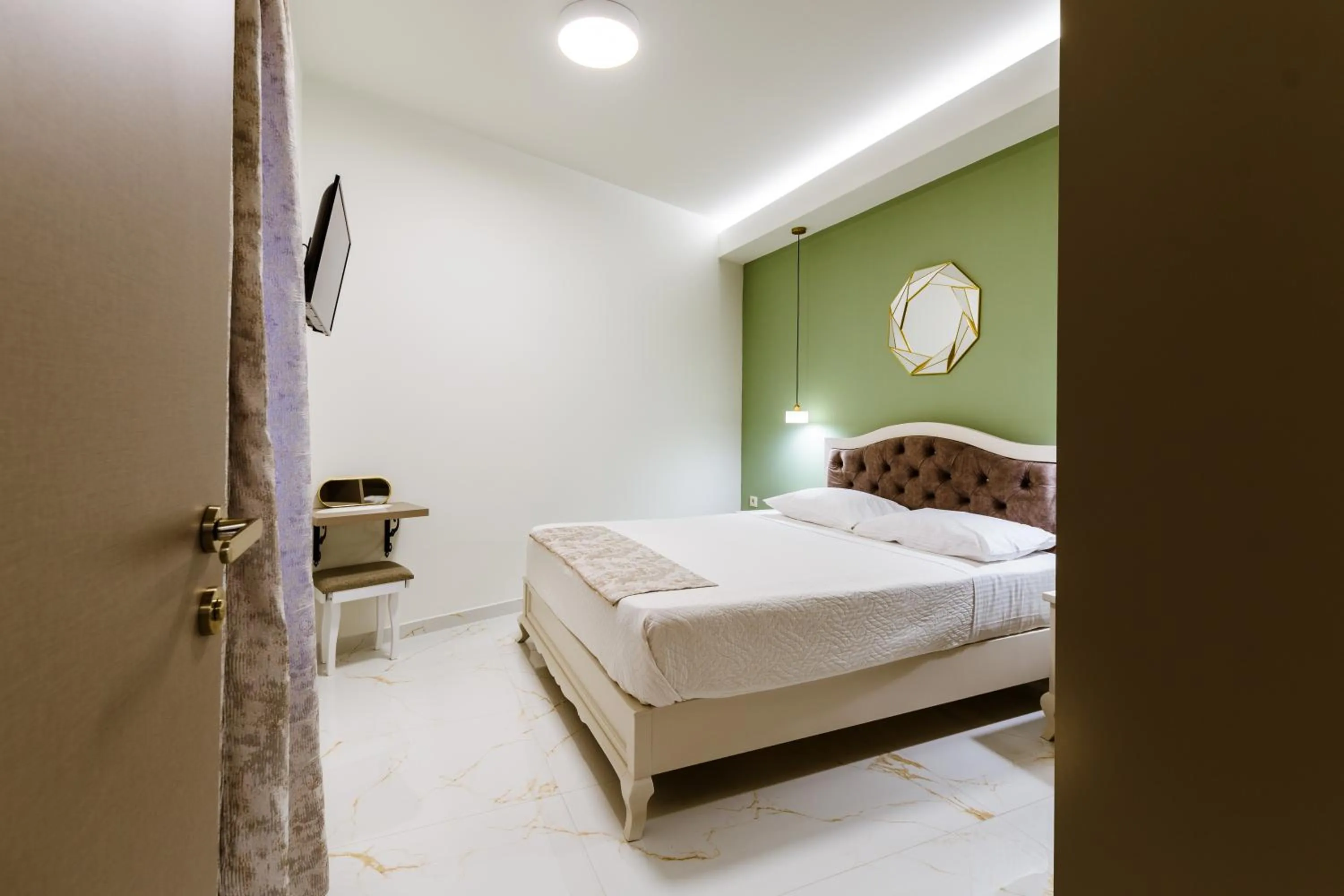 Bed in Konmari Boutique Suites