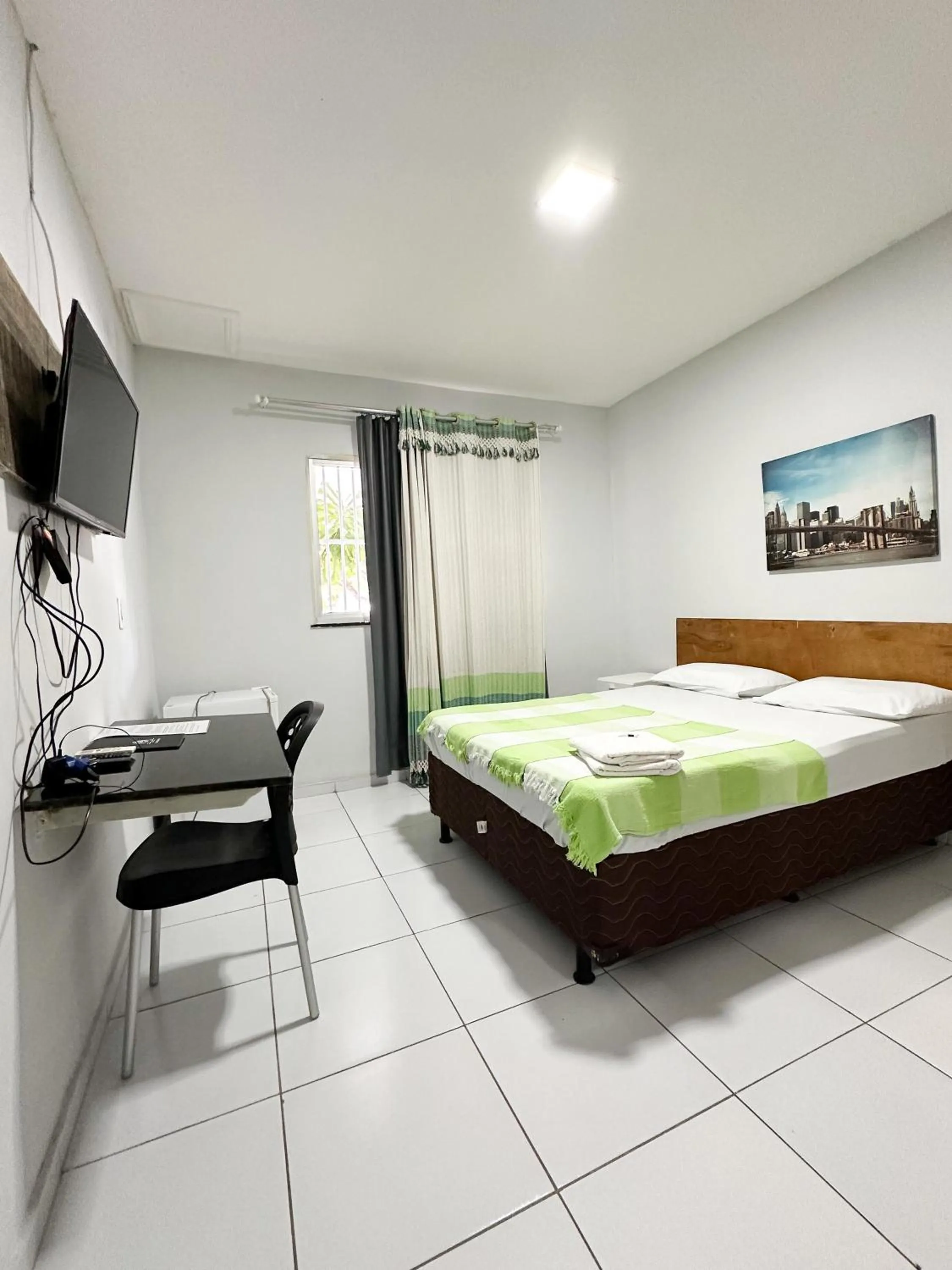 Bed in Hotel Oiticica