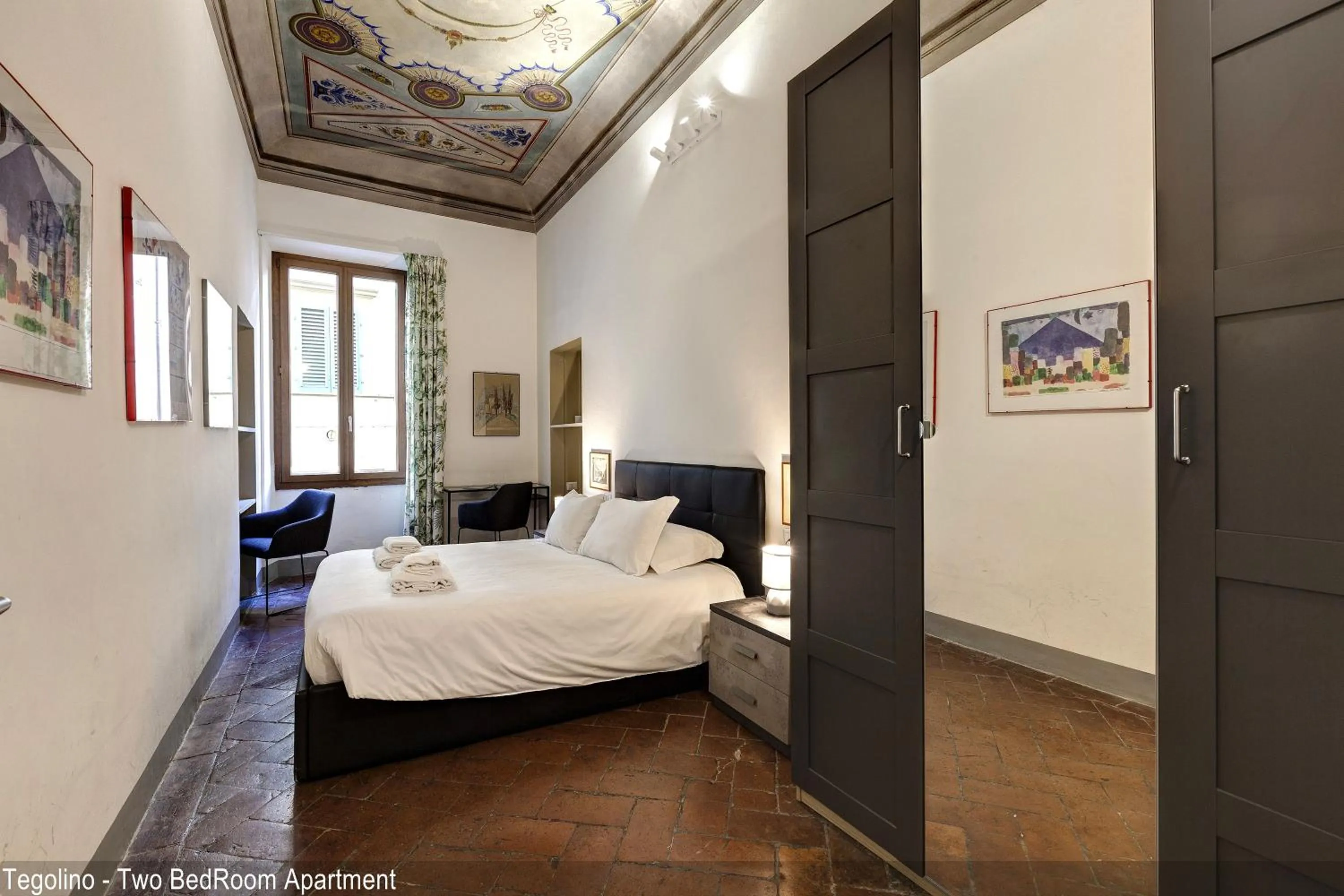 Bedroom, Bed in Tegolaio Apartments by Mamo Florence