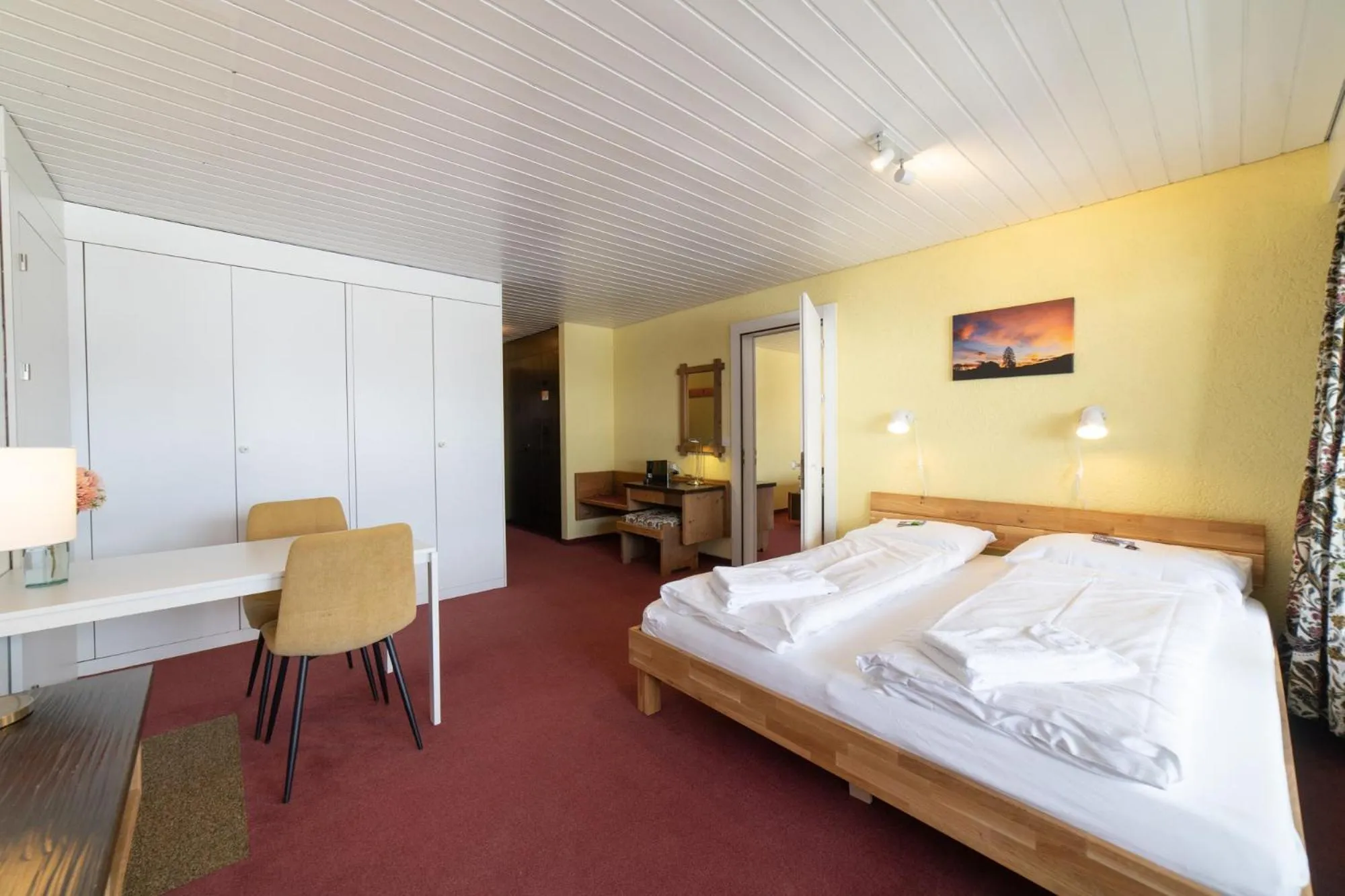 Bed in Hotel Säntis Lodge