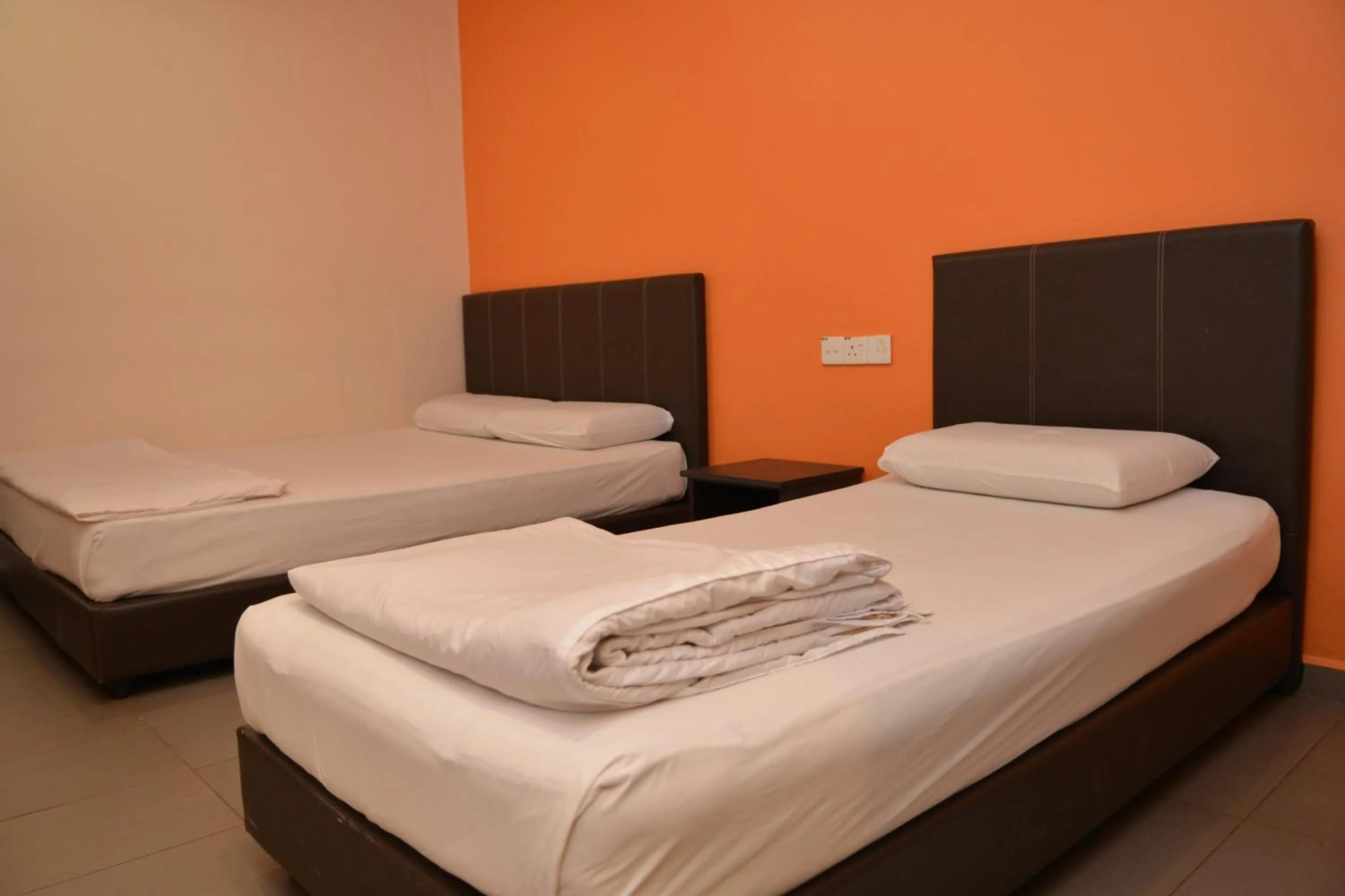 Bed in GF WONDERFUL HOTEL