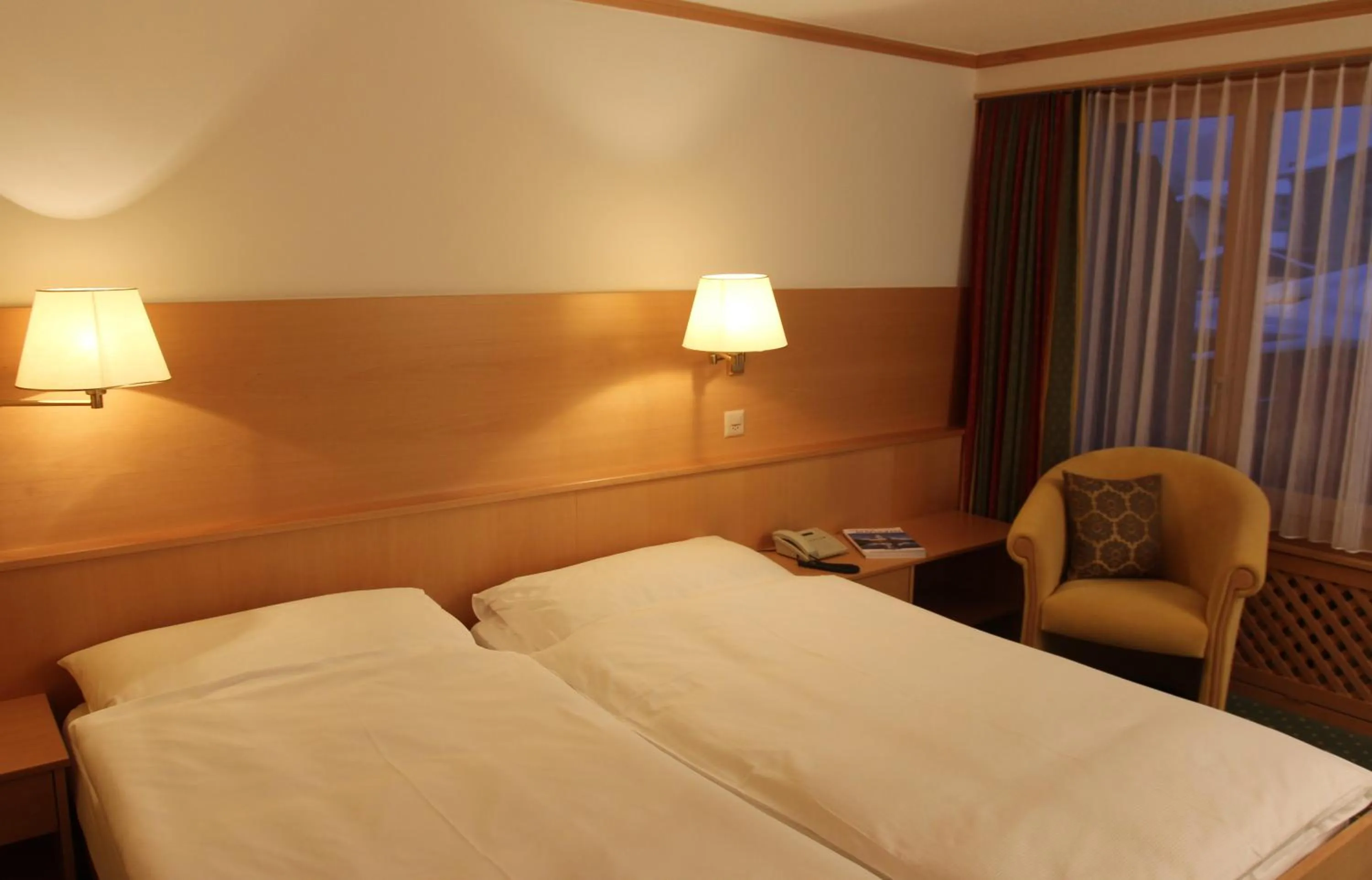 Bed in Hotel Metropol & Spa Zermatt