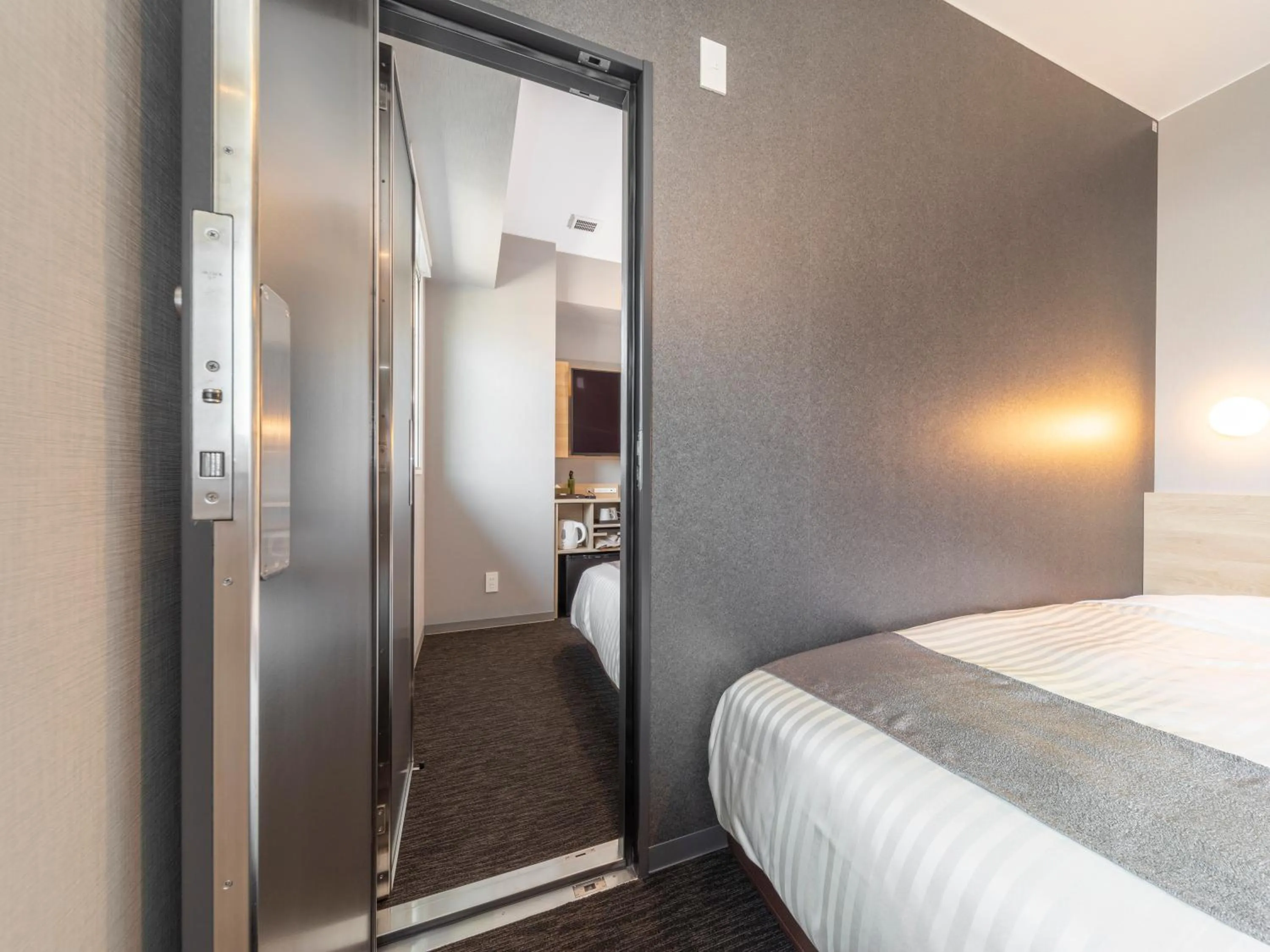 Bed in Super Hotel Premier Kanazawaeki Higashiguchi