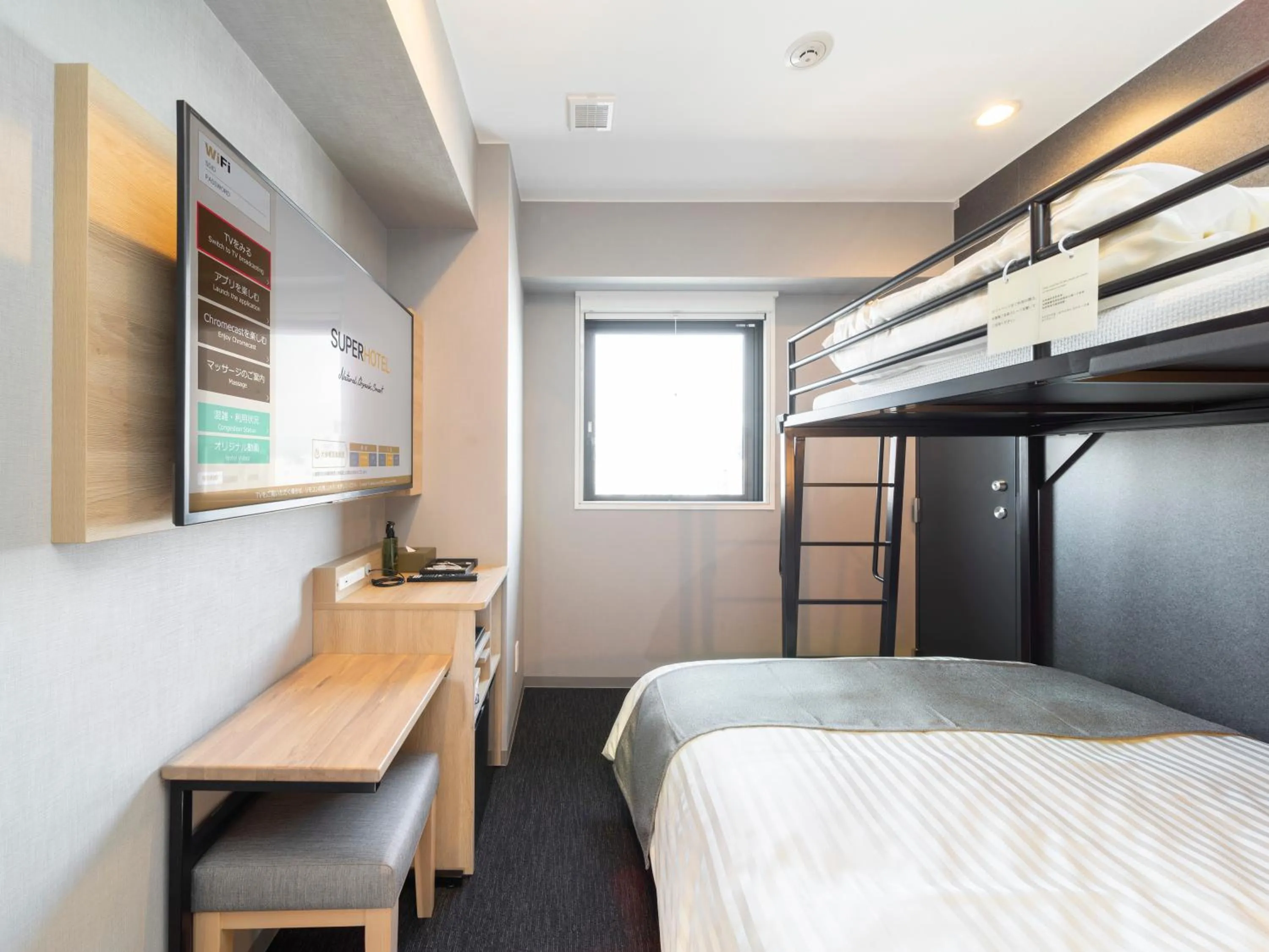 Bed in Super Hotel Premier Kanazawaeki Higashiguchi