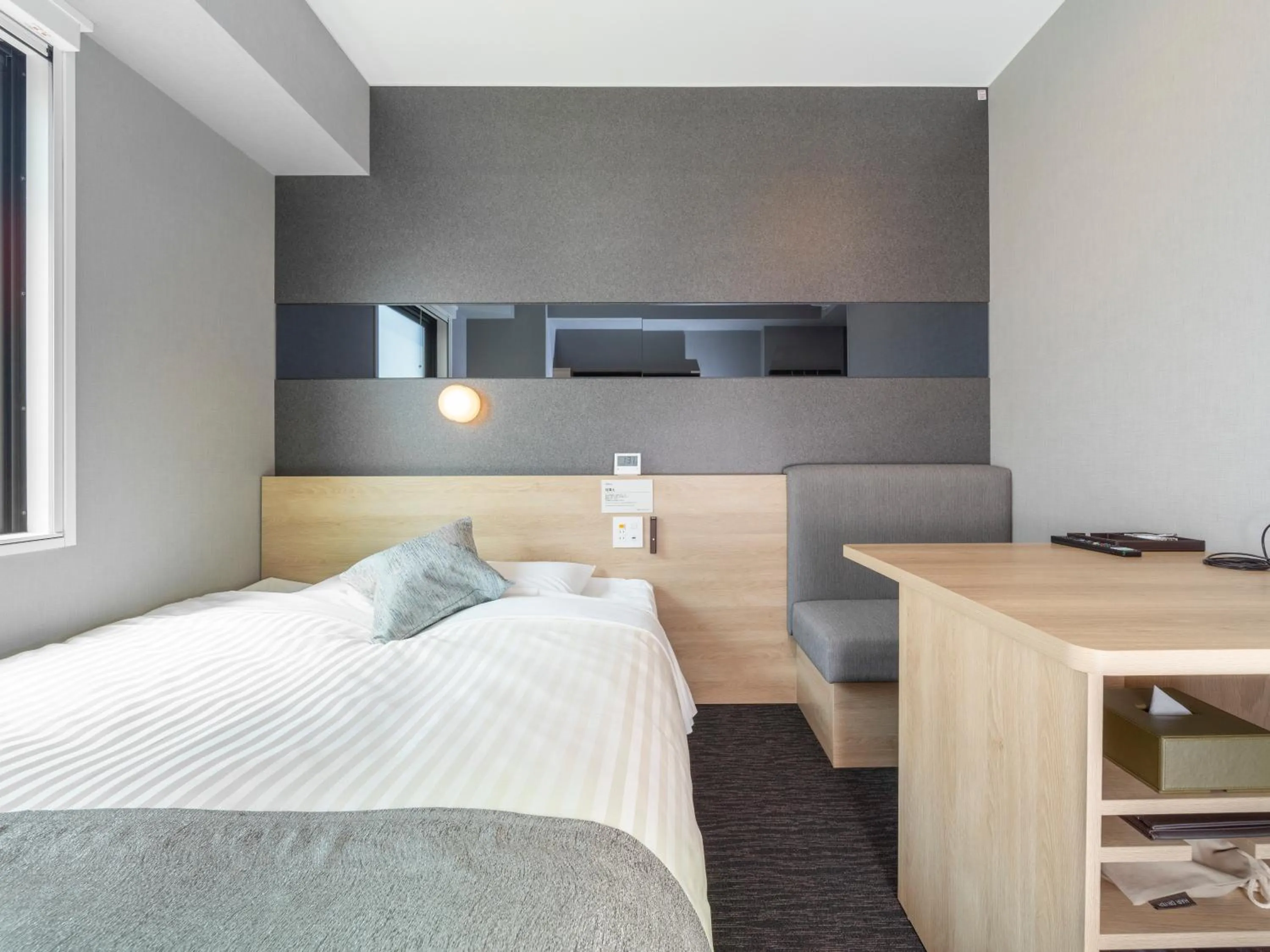 Bed in Super Hotel Premier Kanazawaeki Higashiguchi