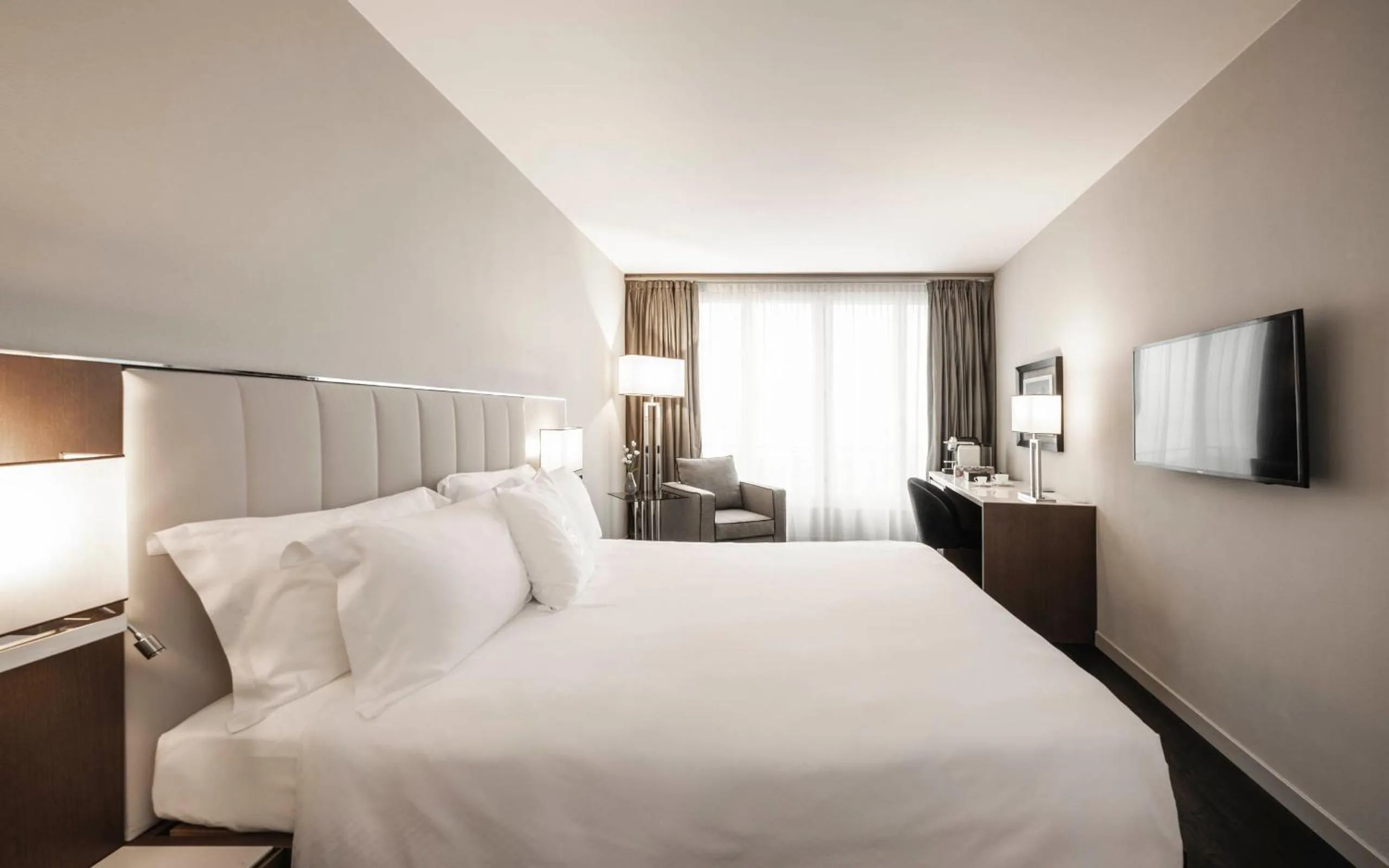 Photo of the whole room, Bed in Hotel Belvedere Locarno