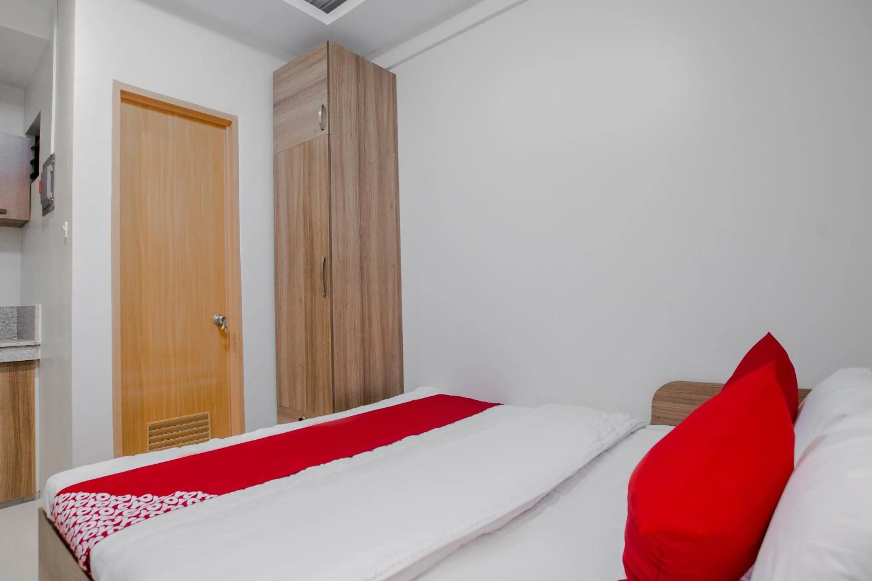 Bedroom in OYO 605 The Quarters