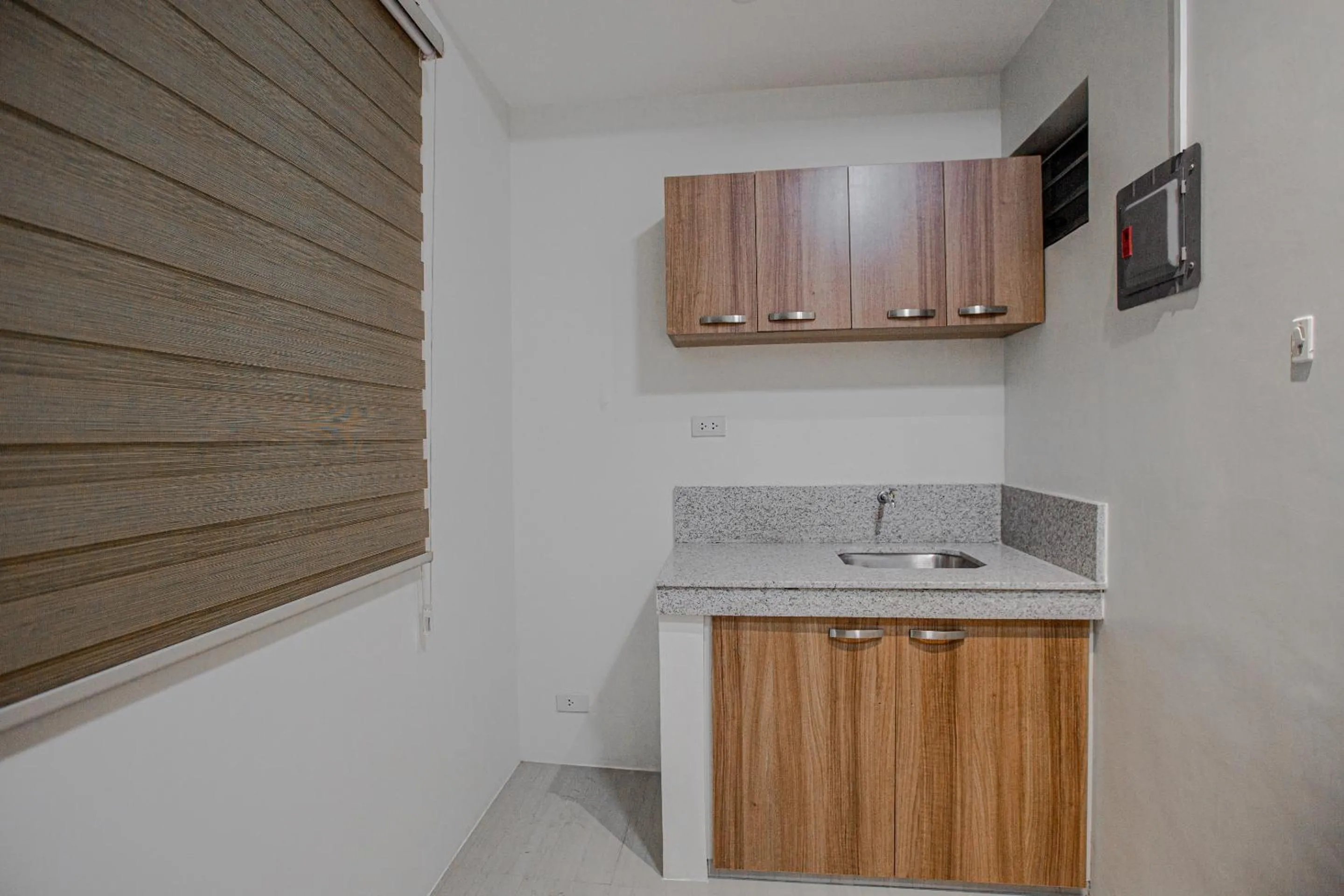 Bedroom in OYO 605 The Quarters