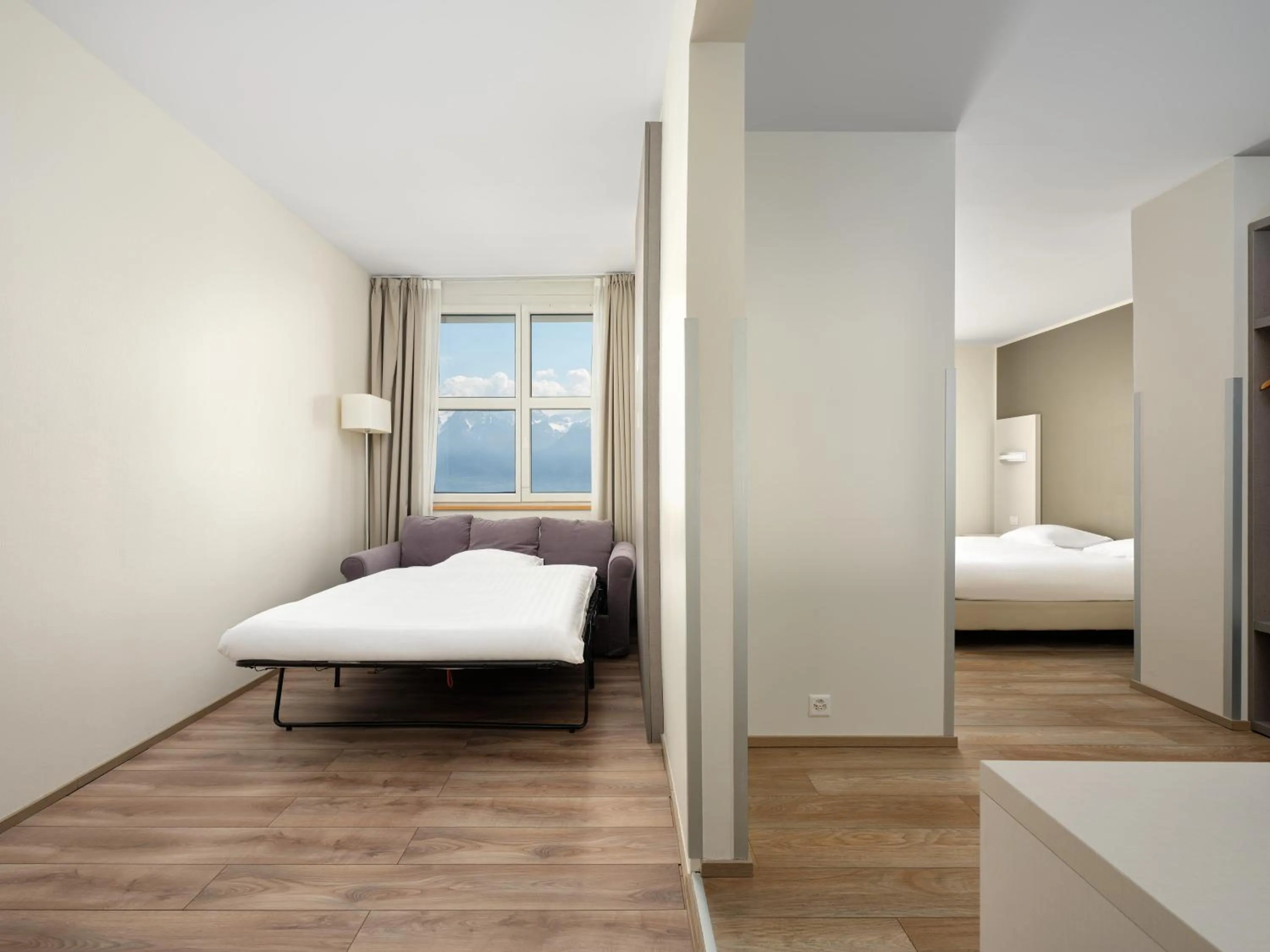 Bed in Hôtel Prealpina