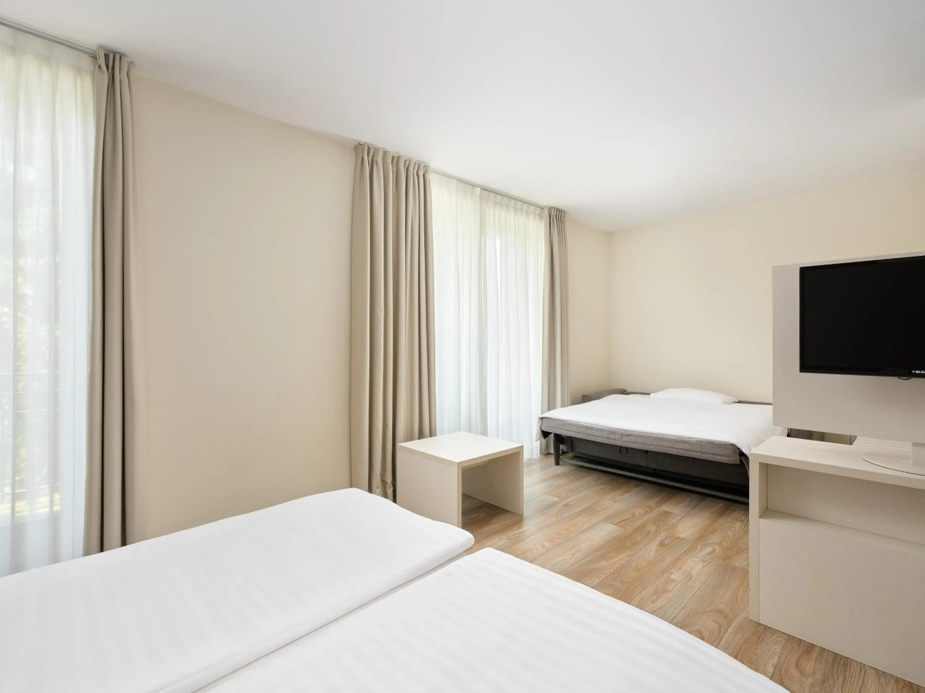 Bed in Hôtel Prealpina