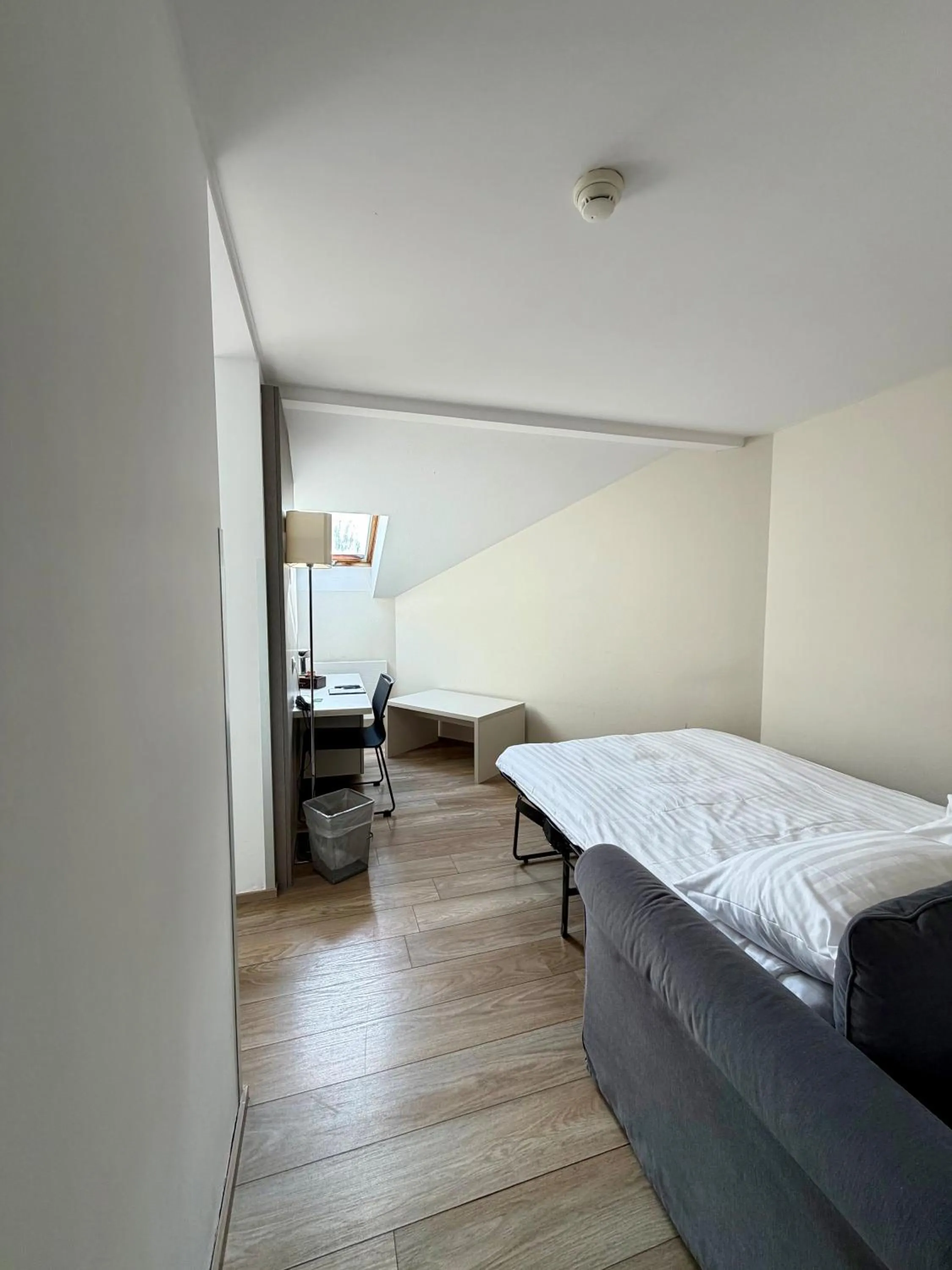 Bed in Hôtel Prealpina