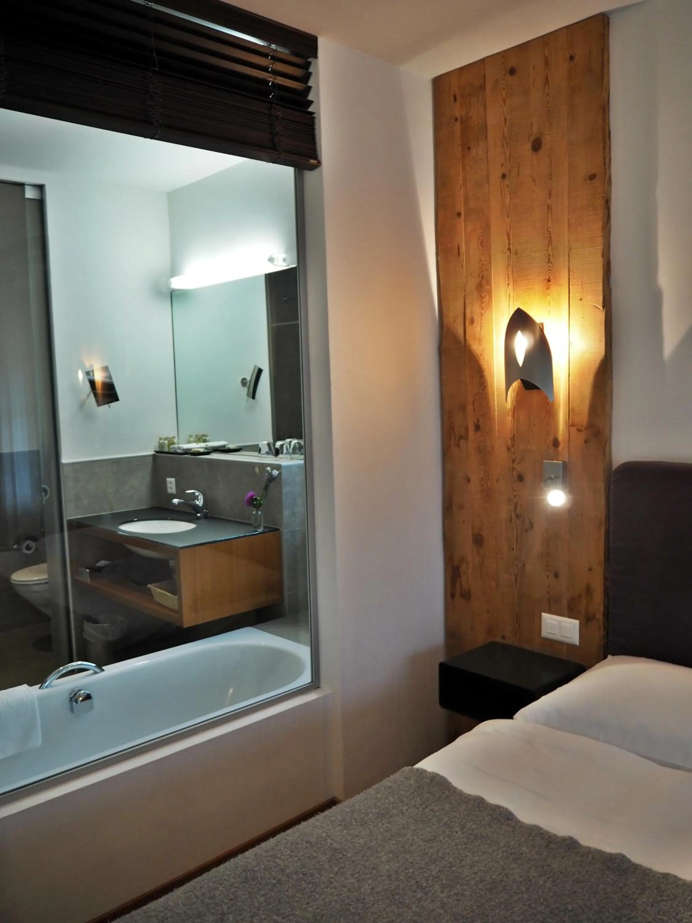 Bathroom, Bed in Le Mirabeau Resort & Spa