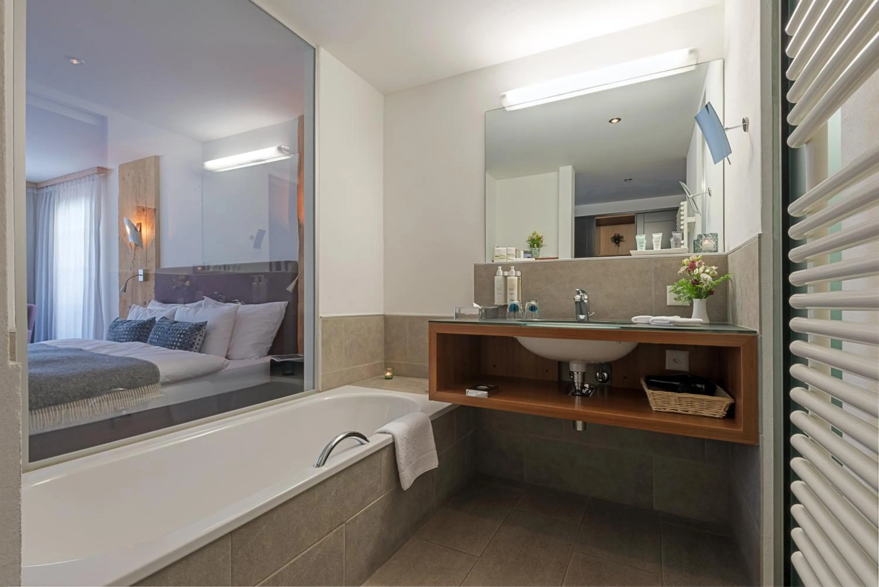 Bathroom, Bed in Le Mirabeau Resort & Spa