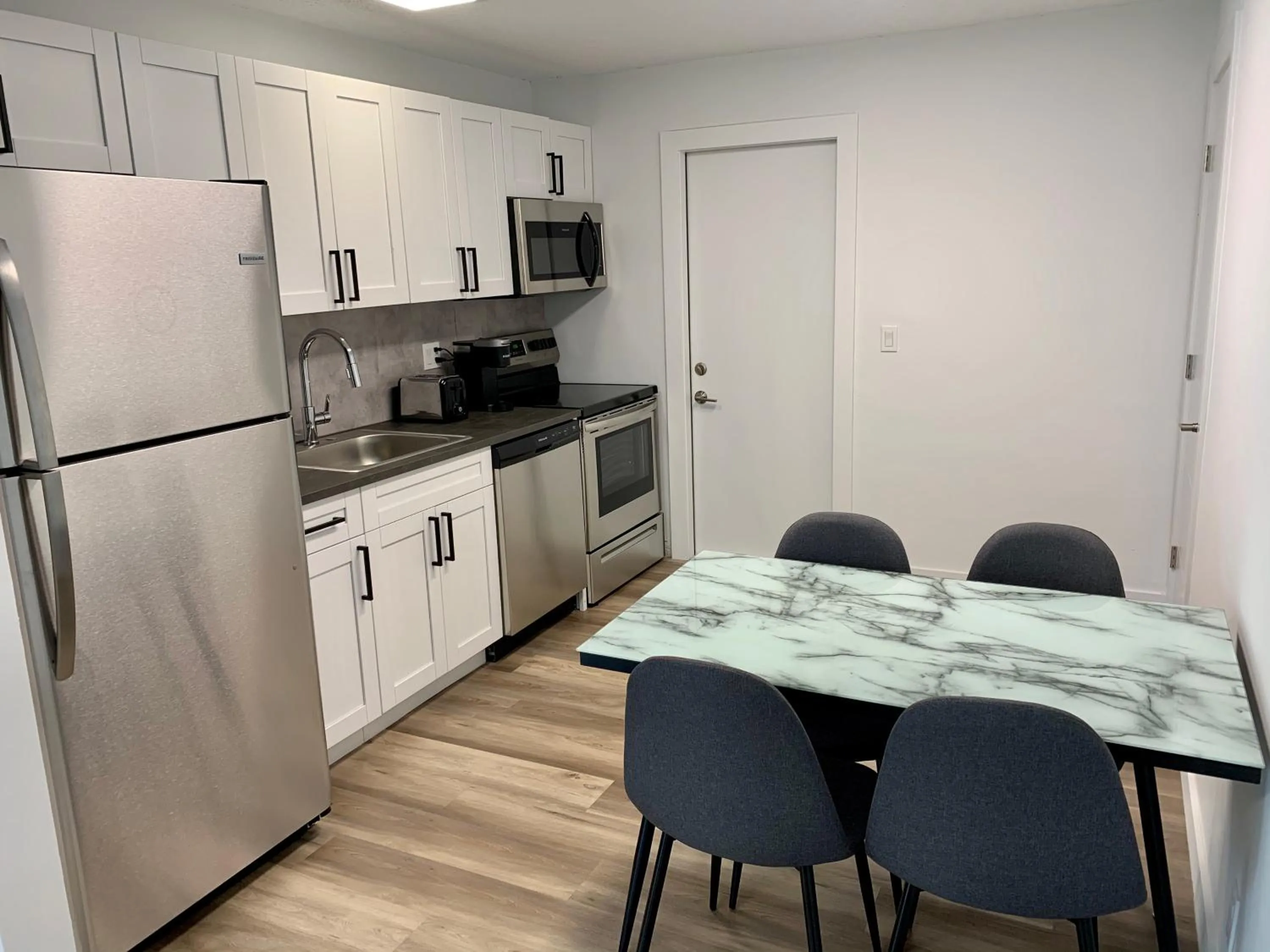 Kitchen or kitchenette in Harbourside Flats