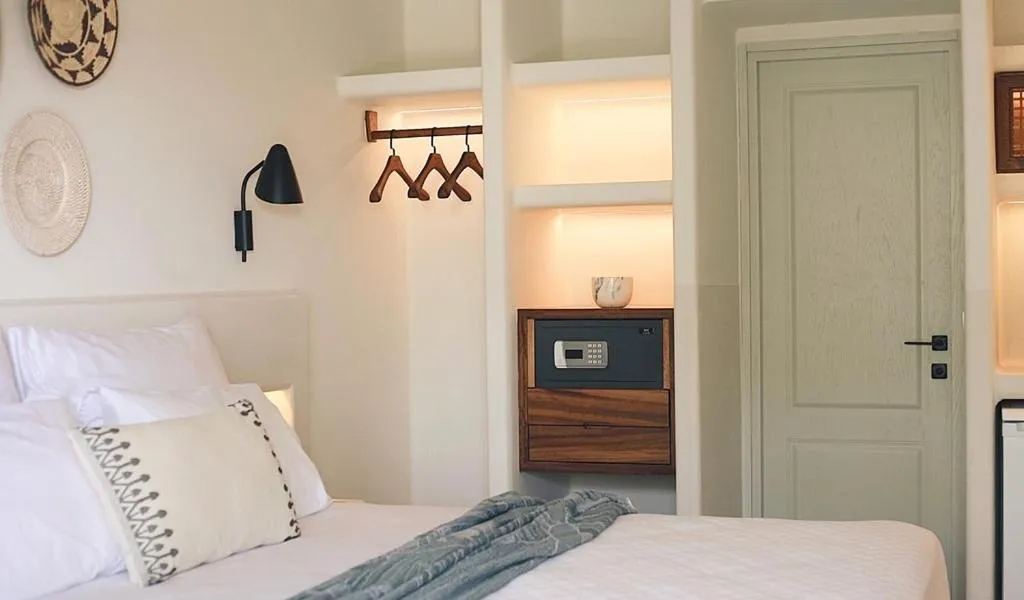 Living room, Bed in Pilos Suites