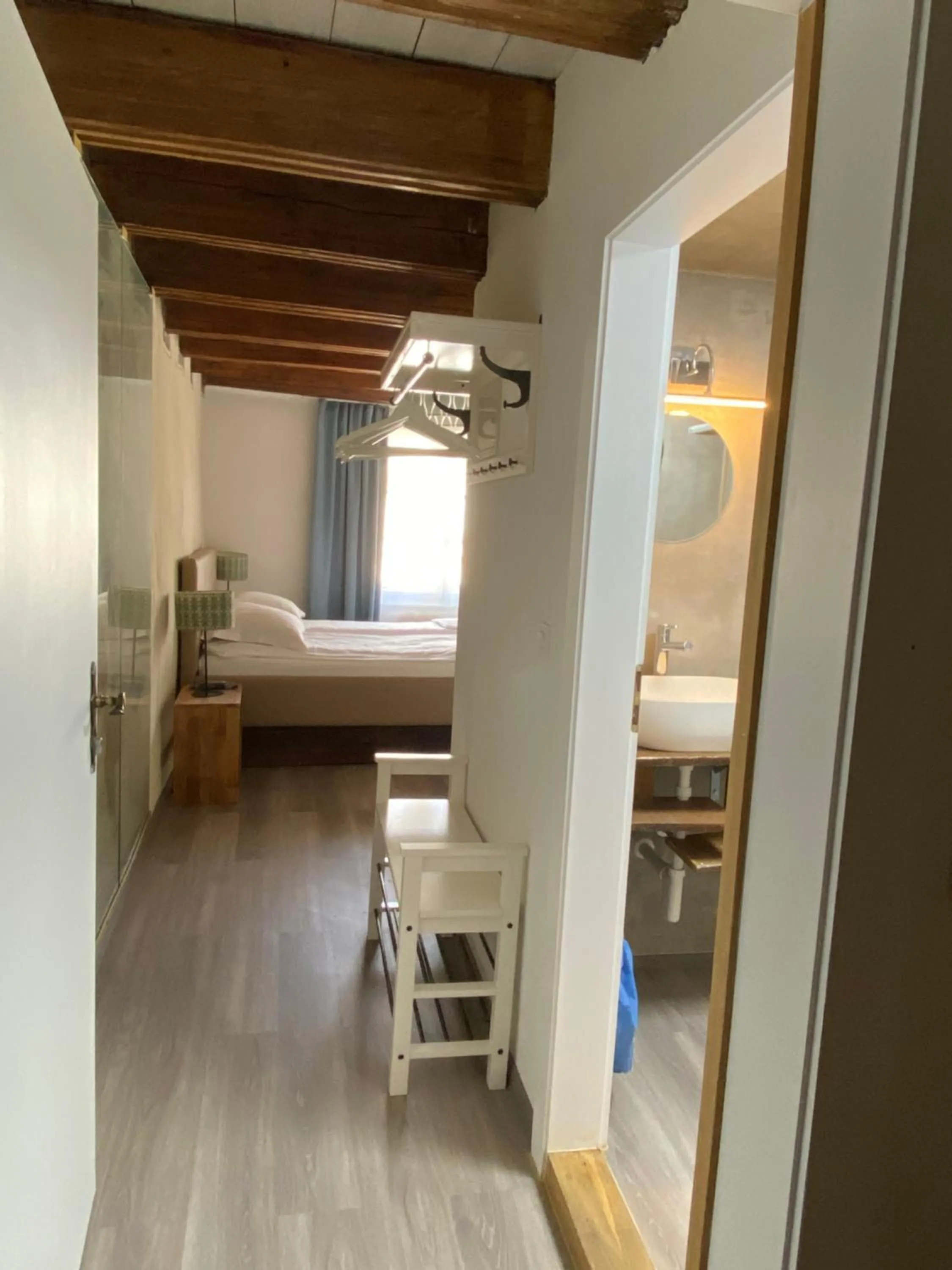 Bed in Aux chambres du Banneret