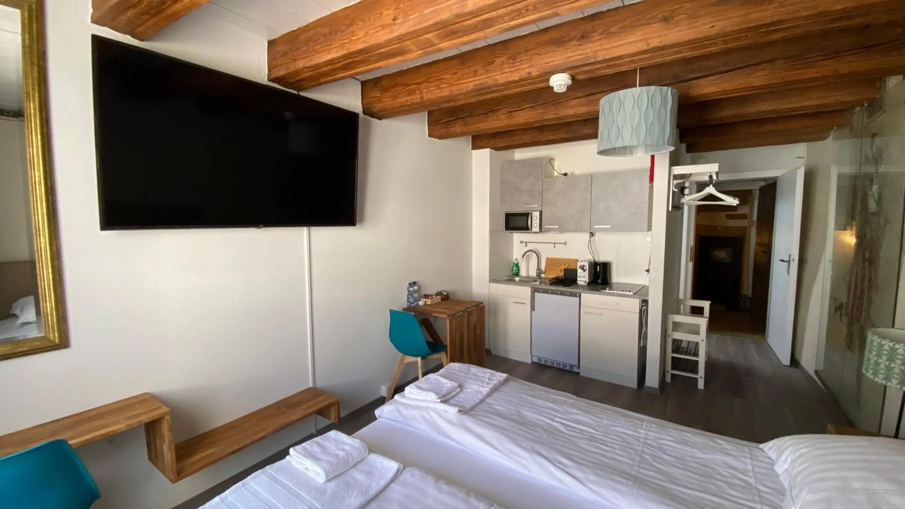 Bed in Aux chambres du Banneret