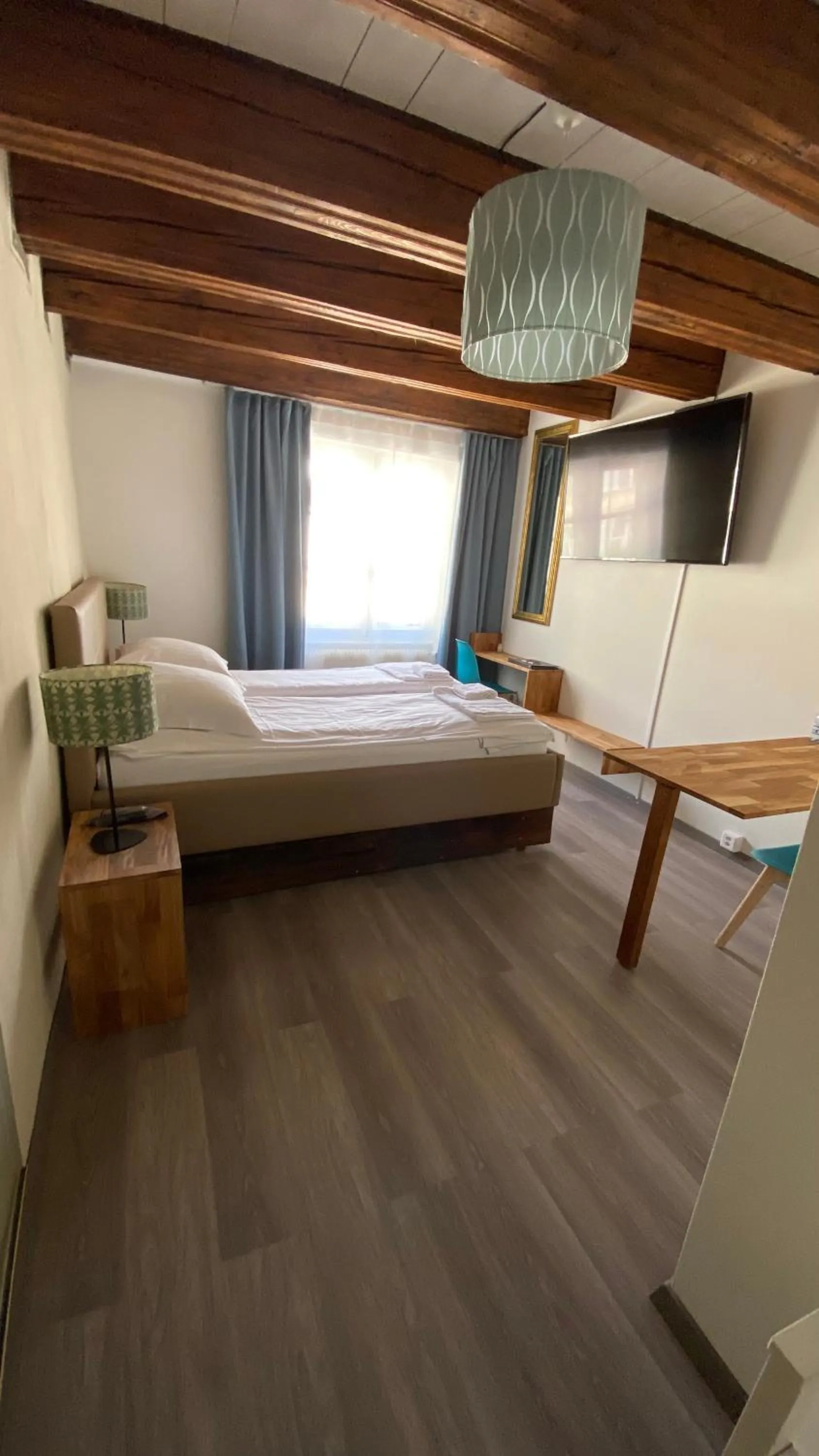 Bed in Aux chambres du Banneret